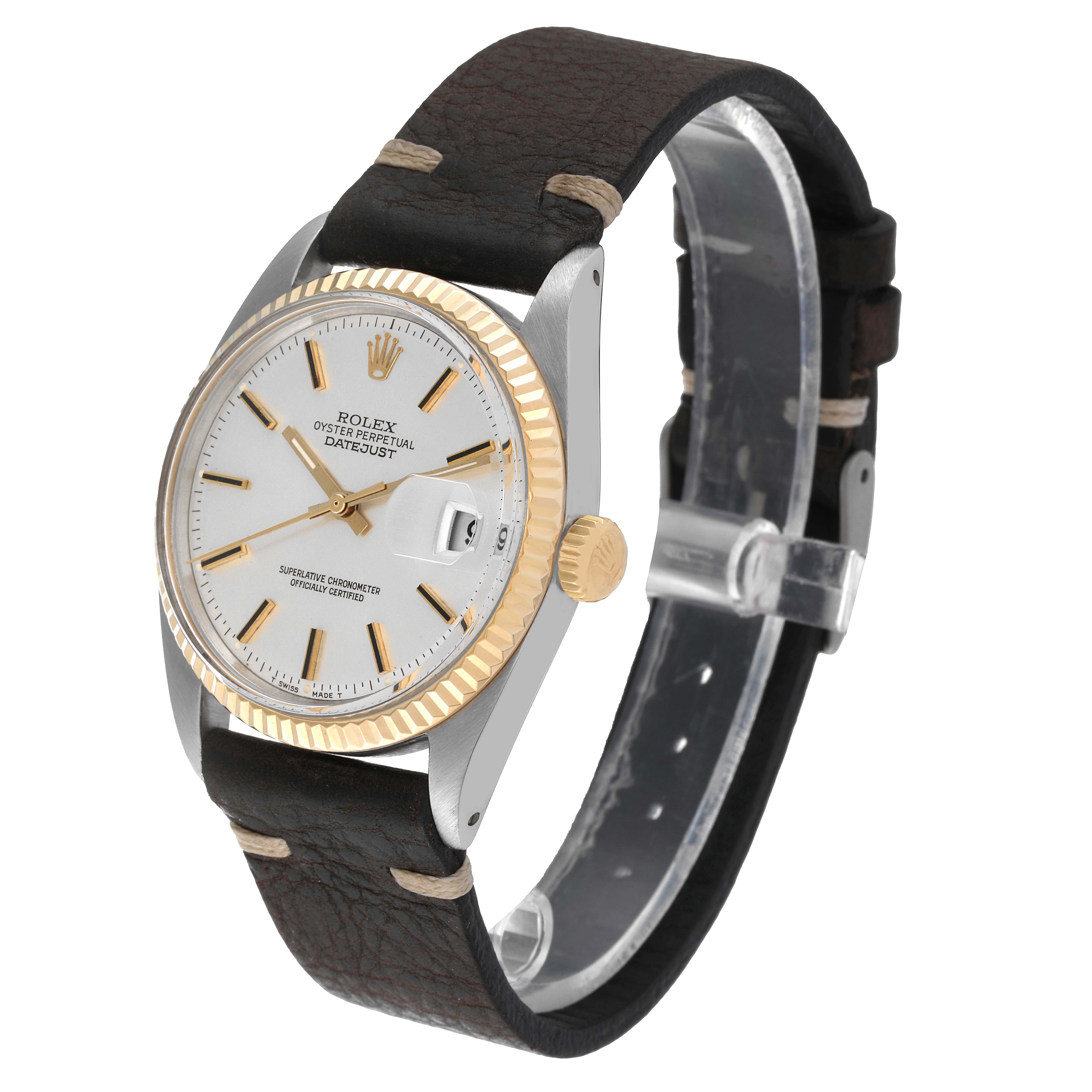 This Rolex Vintage Collection 1601 Men's Steel and Gold (two tone) Silver Dial 1601 Men's Steel and Gold (two tone) Silver Dial model is shown at a three-quarter angle, highlighting its gold bezel, crown, dial, and leather strap.