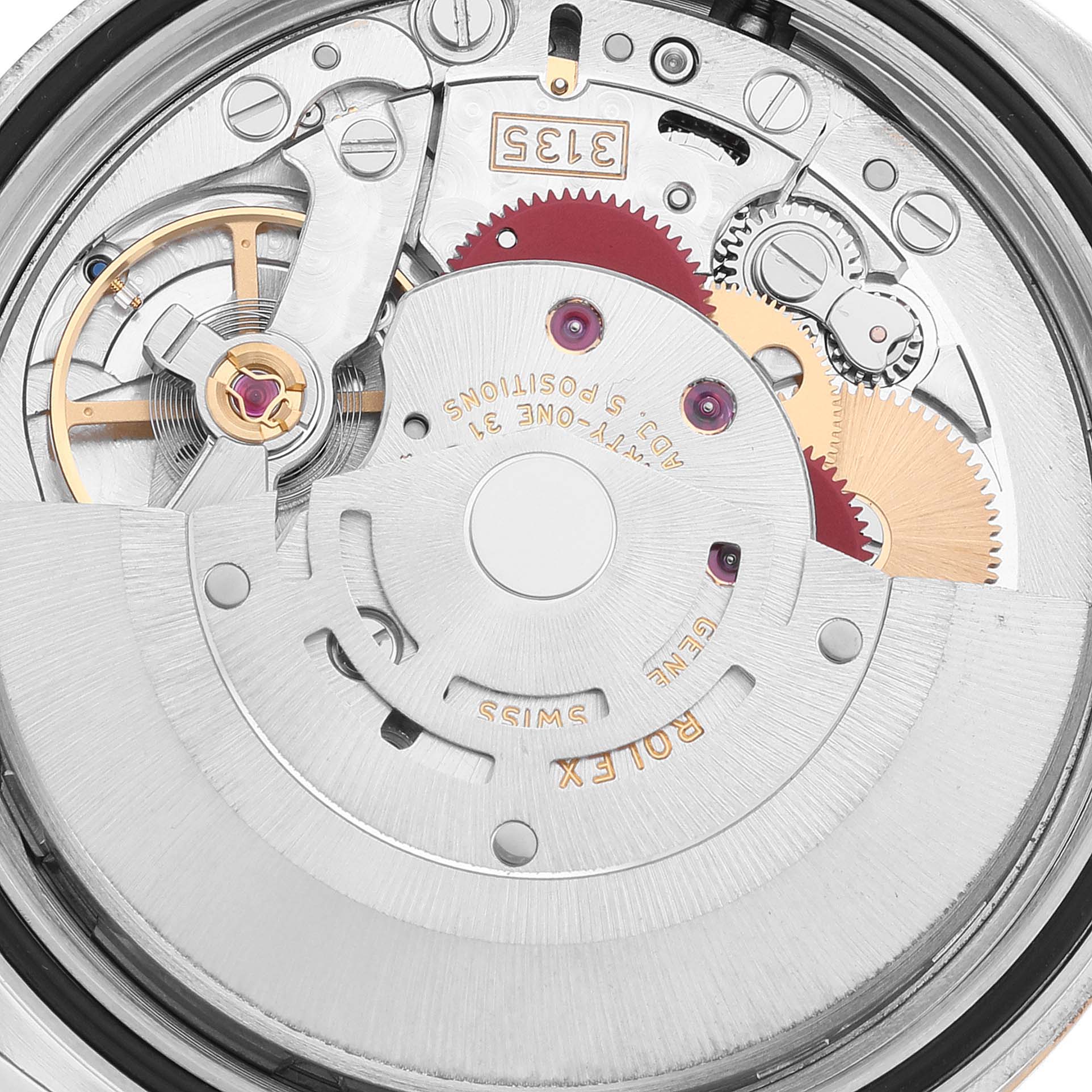 This image shows the inner mechanical movement components of a Rolex Datejust 116233 Men's Steel and Gold (two tone) Silver Dial 116233 Men's Steel and Gold (two tone) Silver Dial watch, viewed from the back.