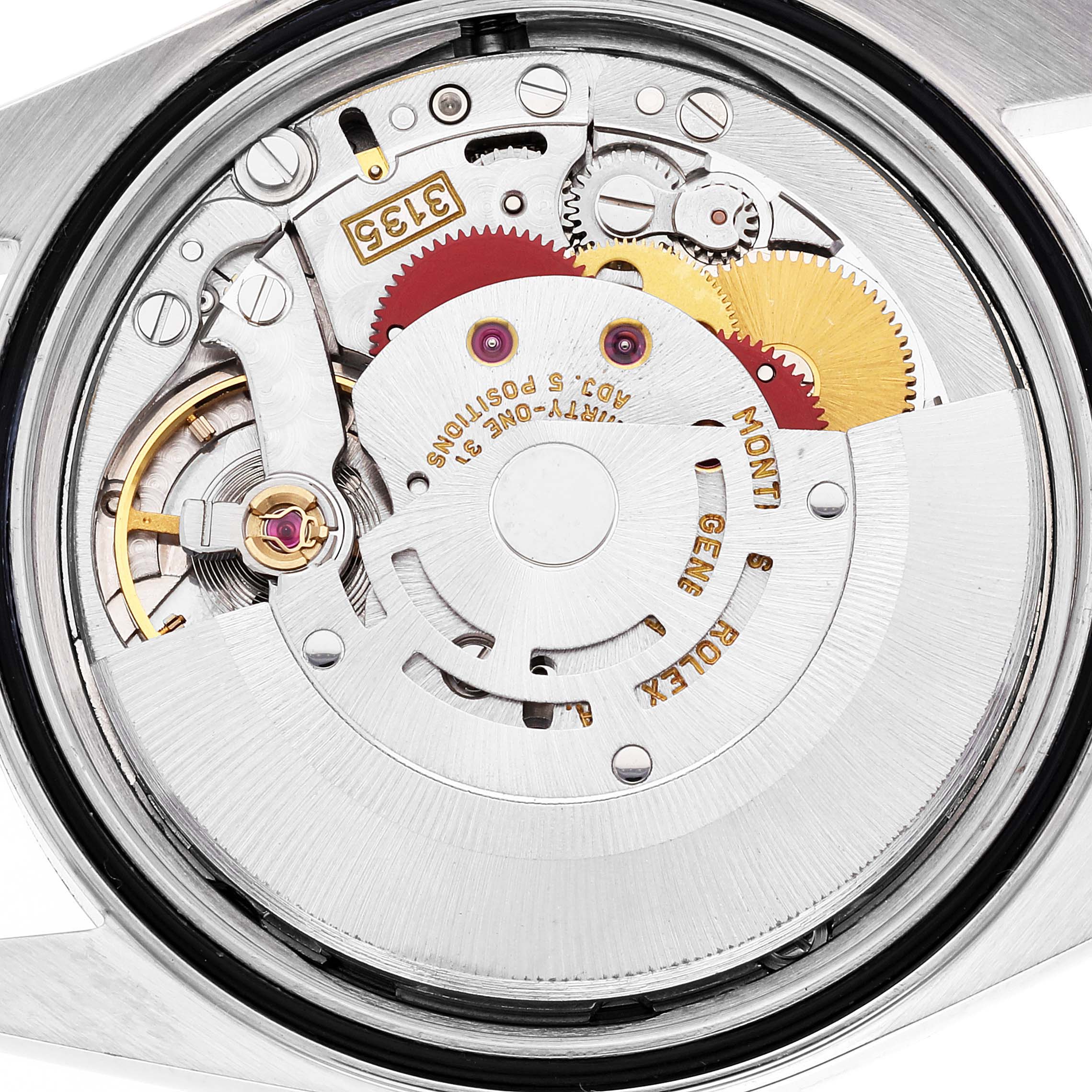 This image shows the internal mechanism of a Rolex Datejust 16233 Men's Steel and Gold (two tone) Grey Dial 16233 Men's Steel and Gold (two tone) Grey Dial watch, showcasing its intricate gears and components.