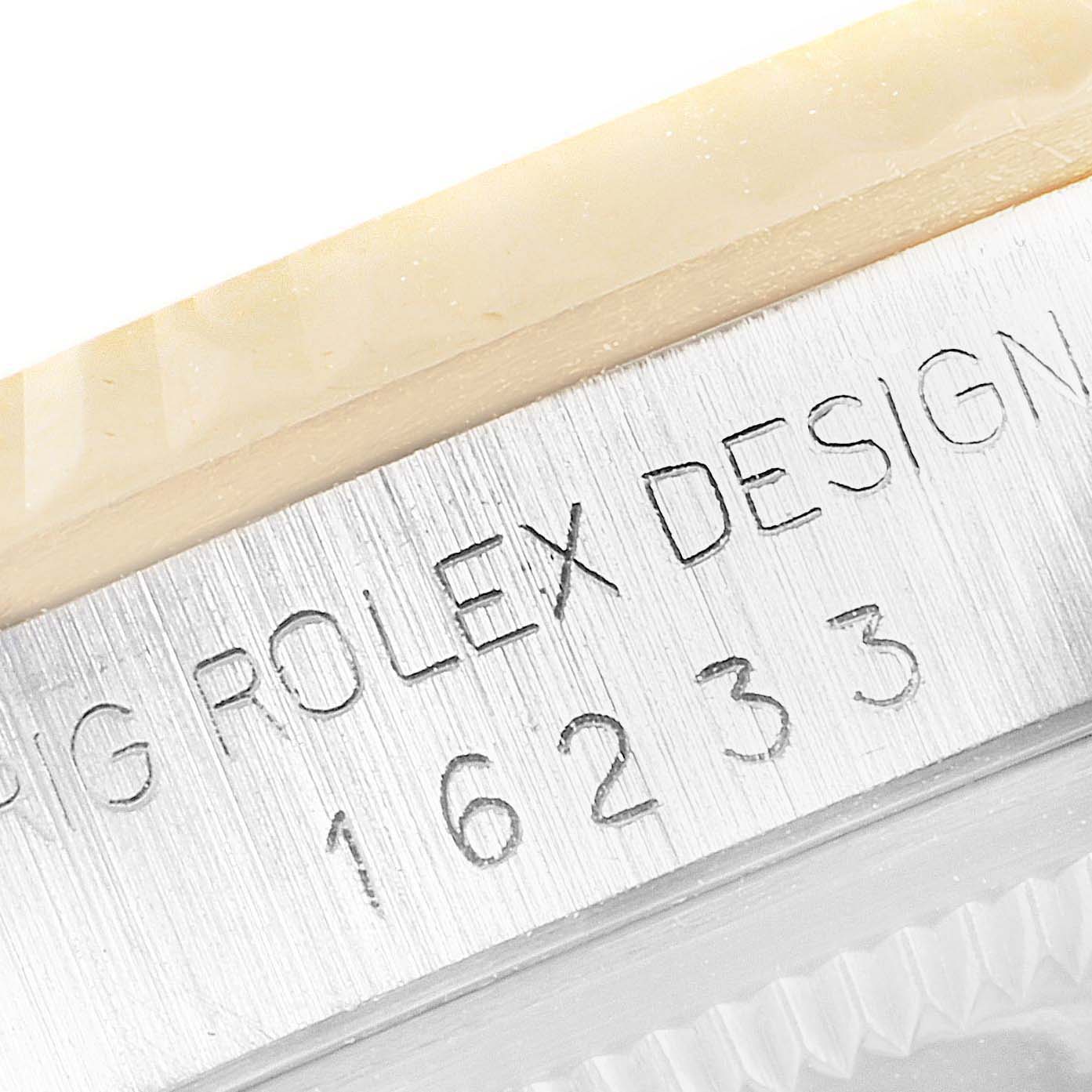 A close-up view of the side of a Rolex Datejust 16233 Men's Steel and Gold (two tone) Champagne Dial 16233 Men's Steel and Gold (two tone) Champagne Dial, showing the model number "16233" engraved on the case.