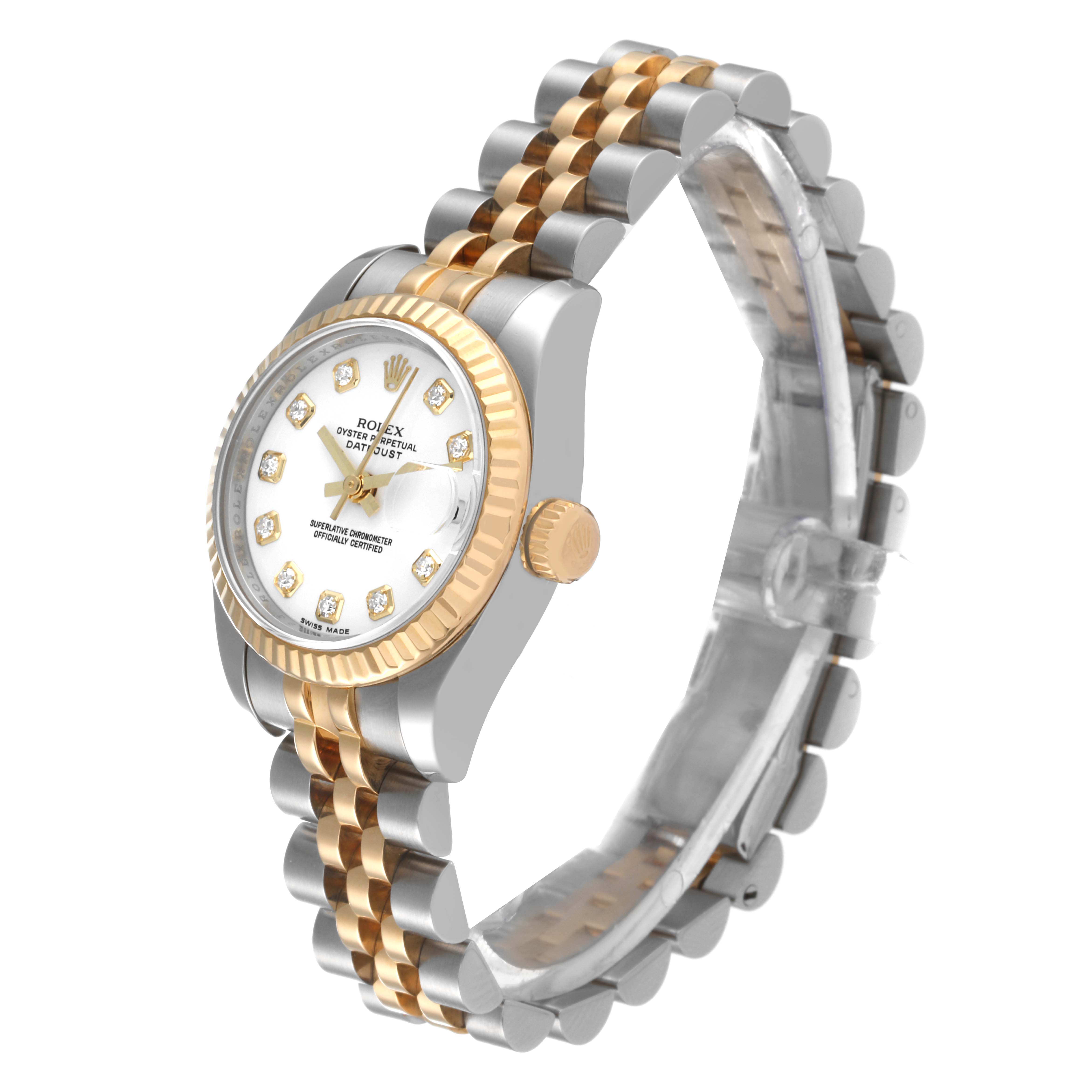 The image shows a Rolex Datejust 179173 Women's Steel and Gold (two tone) White Dial 179173 Women's Steel and Gold (two tone) White Dial watch at a slight angle, highlighting its dial, bezel, crown, and two-tone bracelet.