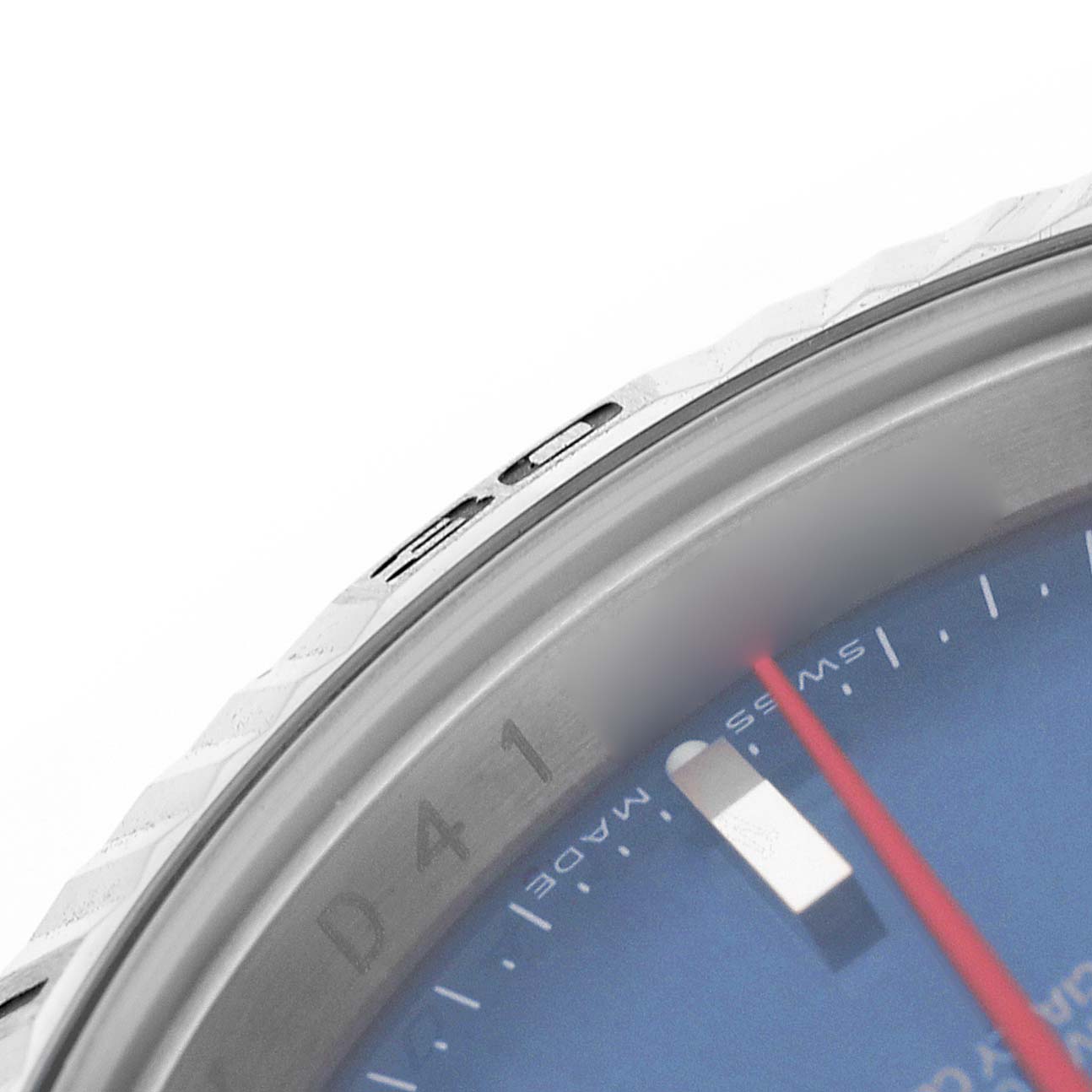 The image shows a close-up of the Rolex Turn-o-Graph 116264 Men's Stainless Steel Blue Dial watch, highlighting the bezel and part of the blue dial.