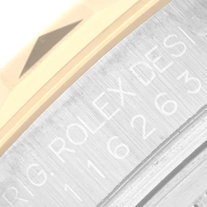 The image shows a close-up of the bezel and engraved model number on the side of a Rolex Turn-o-Graph 116263 Men's Steel and Gold (two tone) White Dial 116263 Men's Steel and Gold (two tone) White Dial watch.