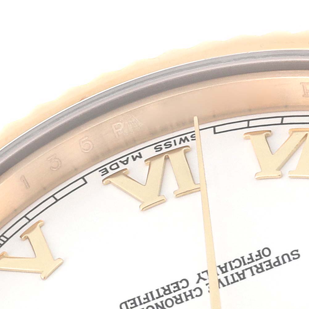 This image shows a close-up view of the dial and bezel of a Rolex President 218238 Men's Yellow Gold White Dial 218238 Men's Yellow Gold White Dial model watch, highlighting the Roman numeral VI.