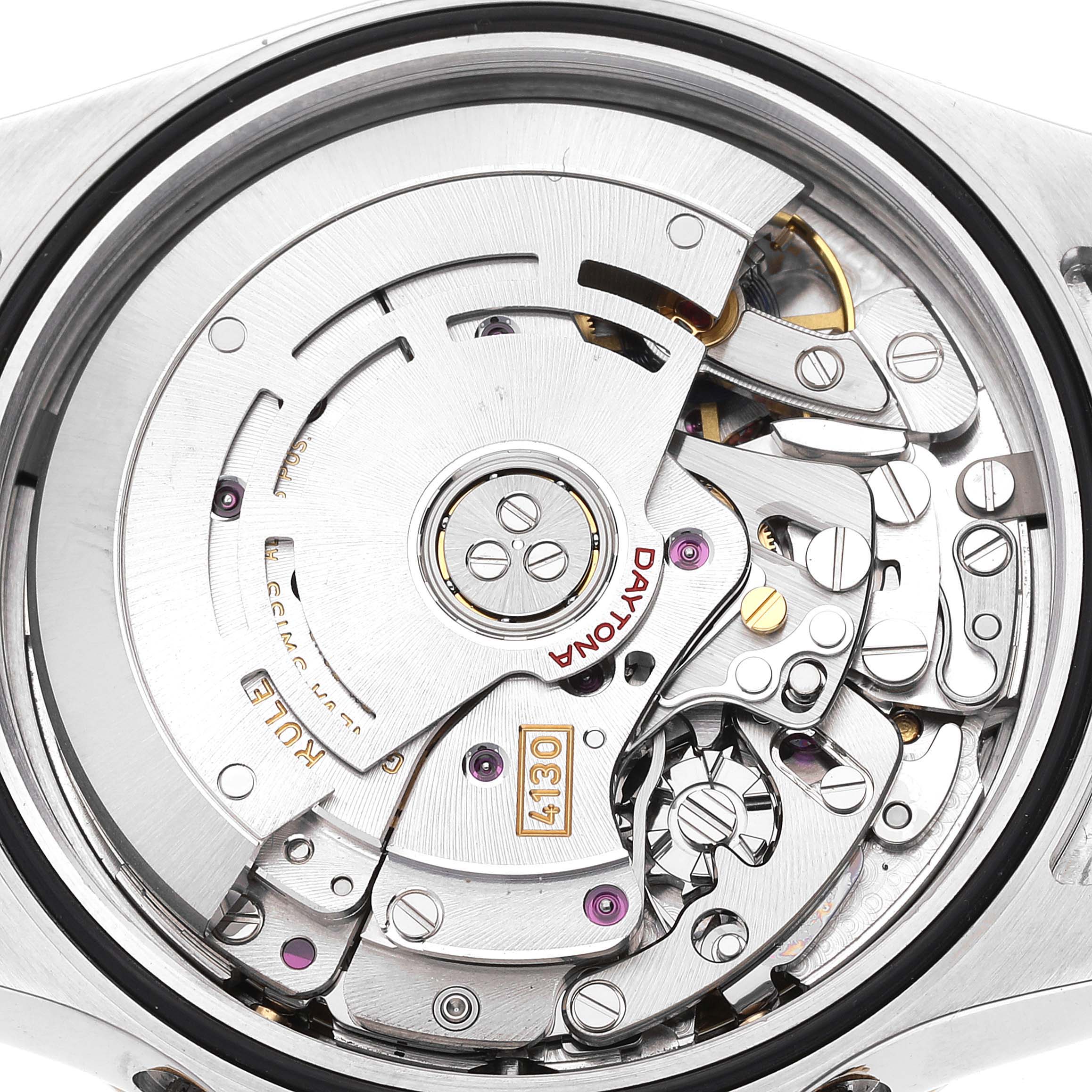 This image shows a close-up view of the movement inside a Rolex Daytona 116503 Men's Steel and Gold (two tone) Mother of Pearl Dial 116503 Men's Steel and Gold (two tone) Mother of Pearl Dial watch.