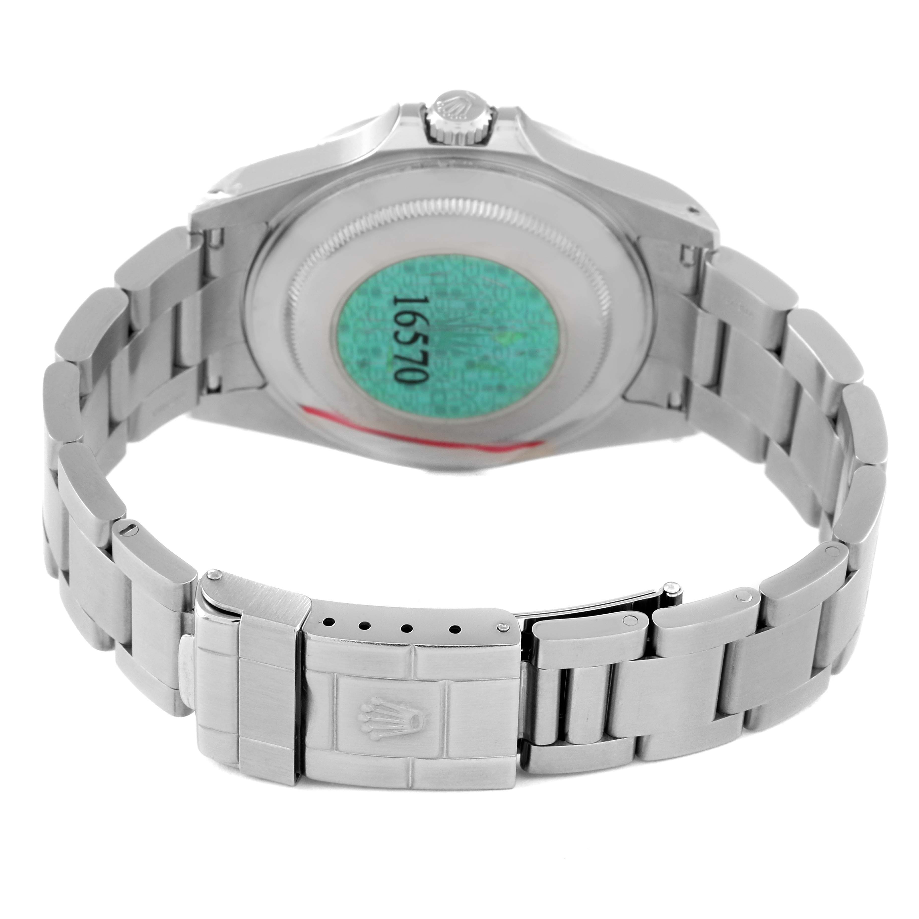 The image shows the back of a Rolex Explorer 16570 Men
s Stainless Steel White Dial 16570 Men
s Stainless Steel White Dial watch, mainly highlighting the bracelet and clasp.