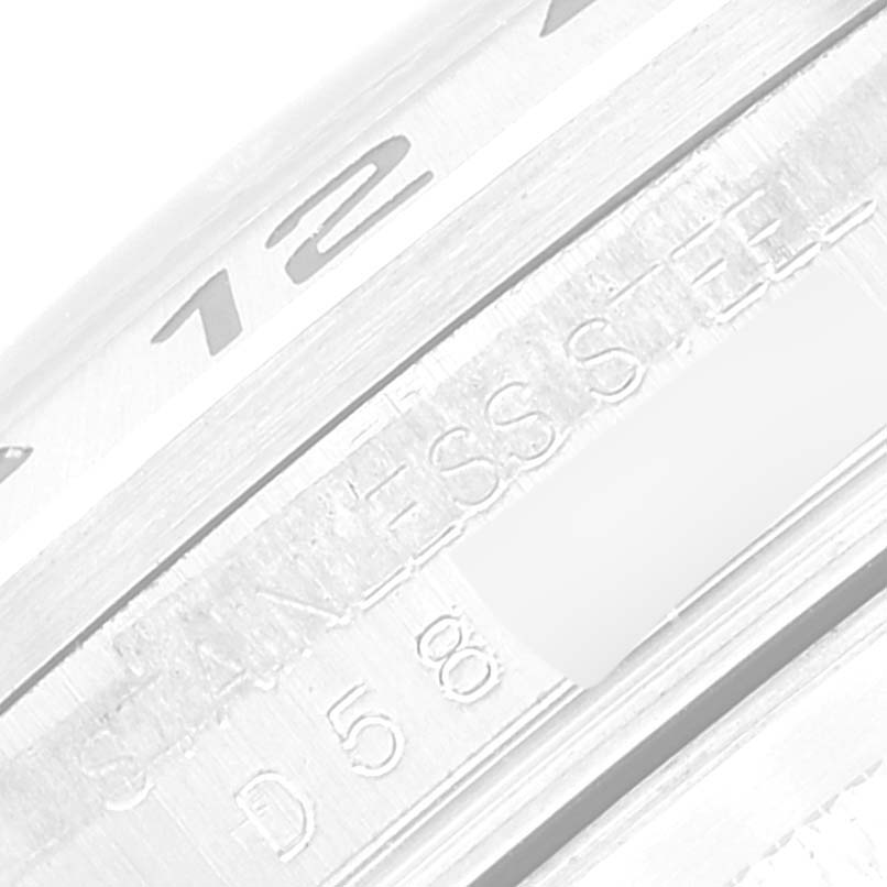 This image shows a close-up of the side engraving and bezel of a Rolex Explorer 16570T Men's Stainless Steel White Dial 16570T Men's Stainless Steel White Dial watch.