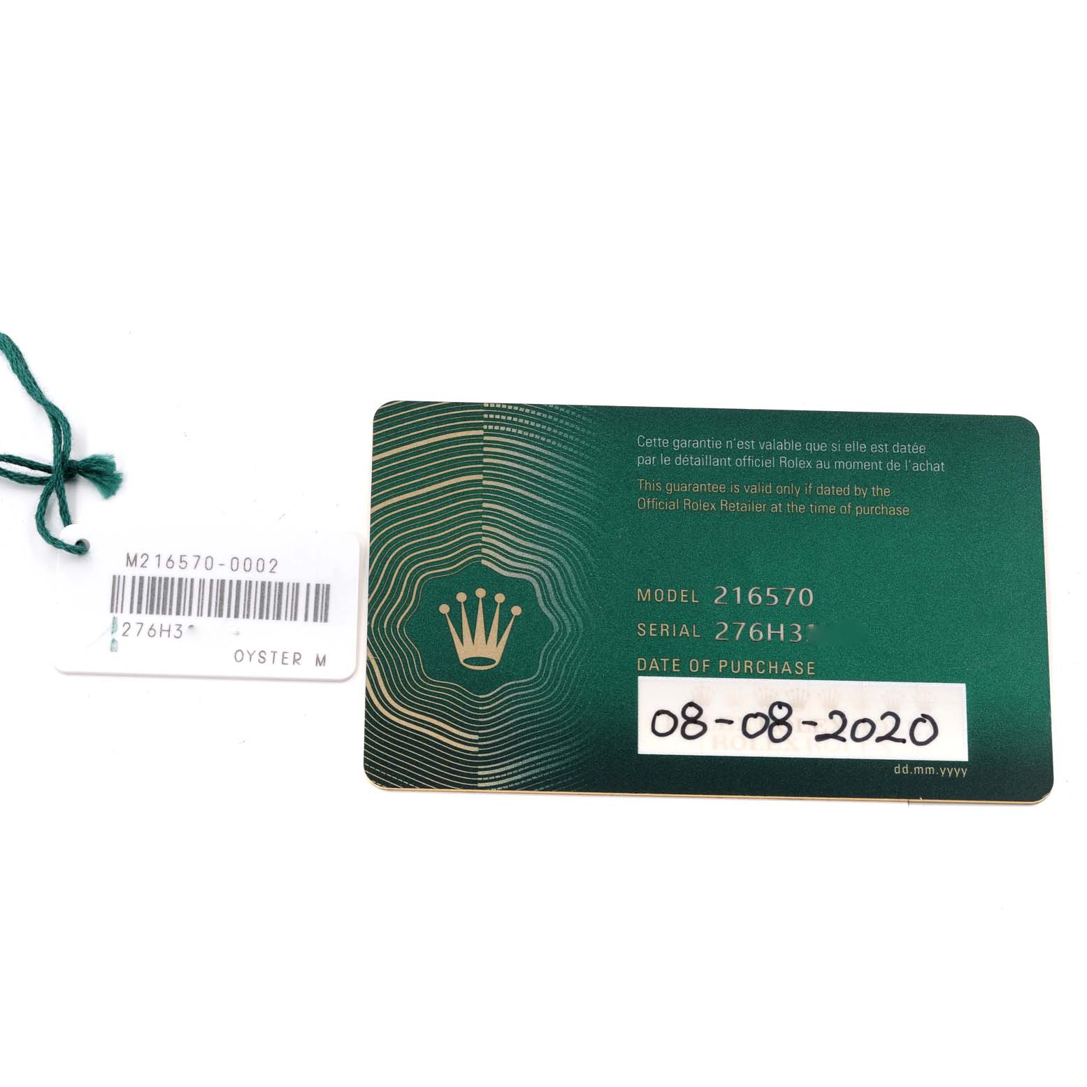 The image shows the warranty card and tag for a Rolex Explorer 216570 Men
s Stainless Steel Black Dial 216570 Men
s Stainless Steel Black Dial model 216570 watch.