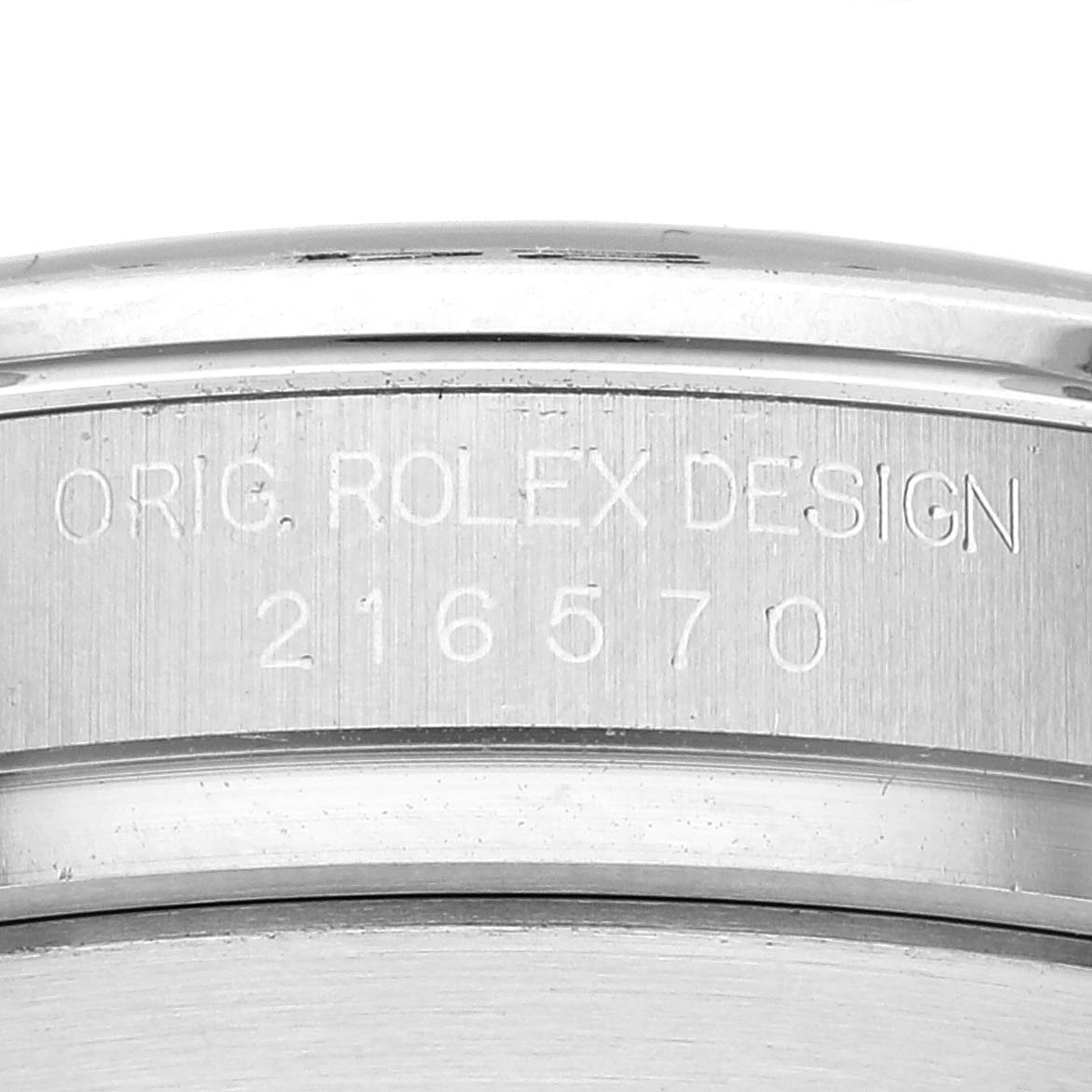 This image shows a close-up of the case back with the serial number and "ORIG. ROLEX DESIGN" engraved on the Rolex Explorer 216570 Men
s Stainless Steel Black Dial 216570 Men
s Stainless Steel Black Dial watch.