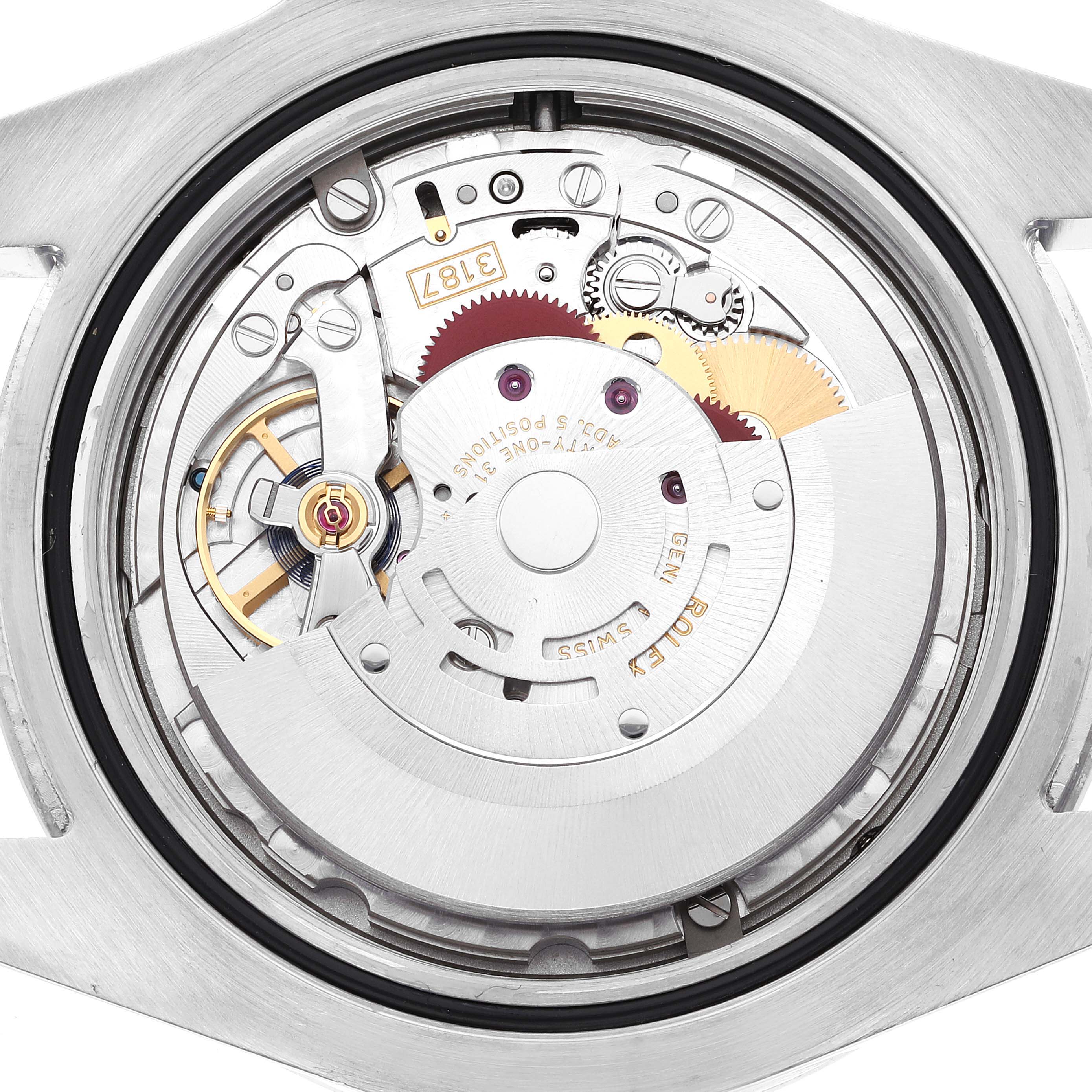This image shows the internal mechanism and parts of a Rolex Explorer 216570 Men
s Stainless Steel White Dial 216570 Men
s Stainless Steel White Dial model watch from a rear view angle with the case back removed.