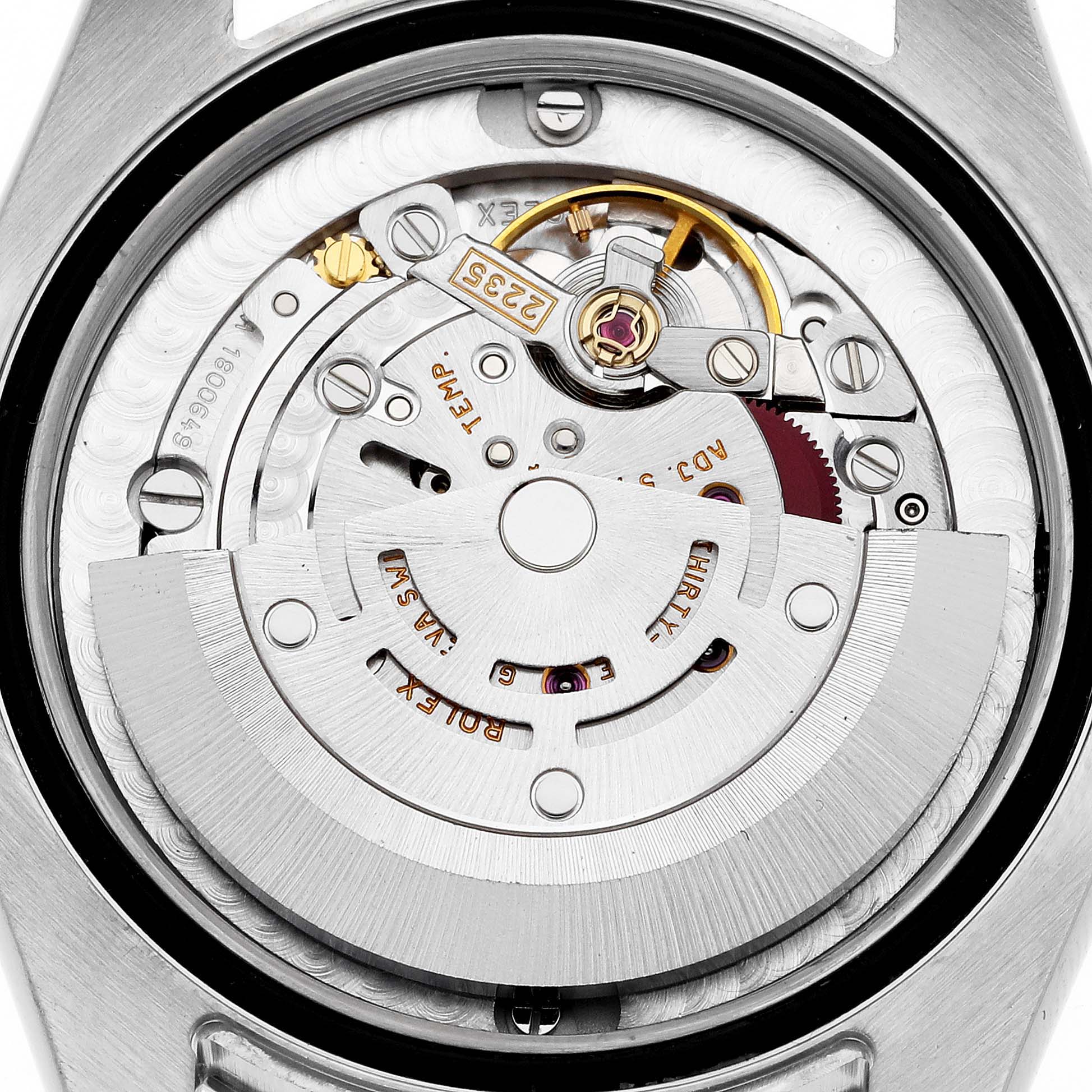 The image shows the inner mechanical movement of a Rolex Mid-Size 178240 Women's Stainless Steel Pink Dial 178240 Women's Stainless Steel Pink Dial model watch, viewed from the back case.