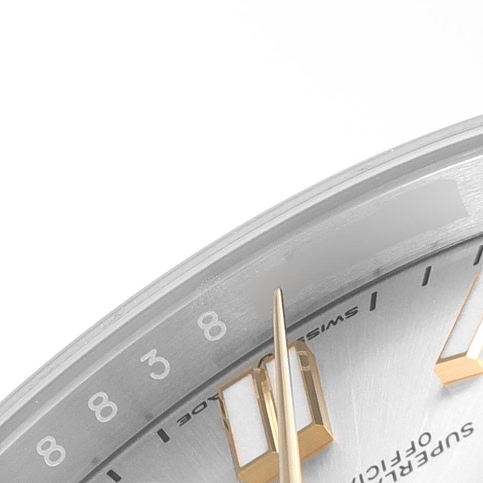 The image shows a close-up of the dial, hour markers, and minute hand of a Rolex Oyster Perpetual 124300 Men's Stainless Steel Silver Dial 124300 Men's Stainless Steel Silver Dial watch.