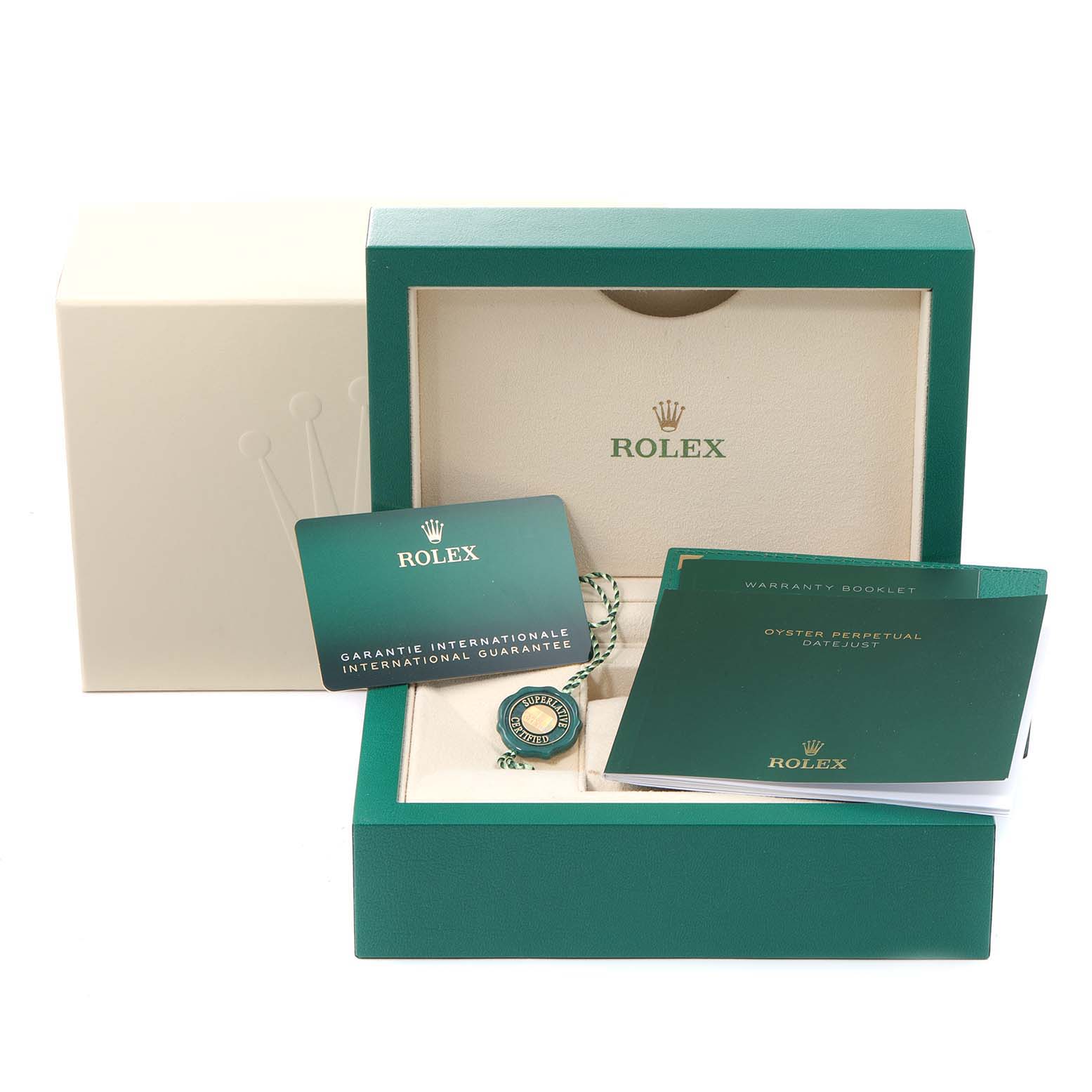 The image shows the accessories for a Rolex Oyster Perpetual 124300 Men's Stainless Steel Silver Dial 124300 Men's Stainless Steel Silver Dial watch including warranty booklet, guarantee card, and a box.