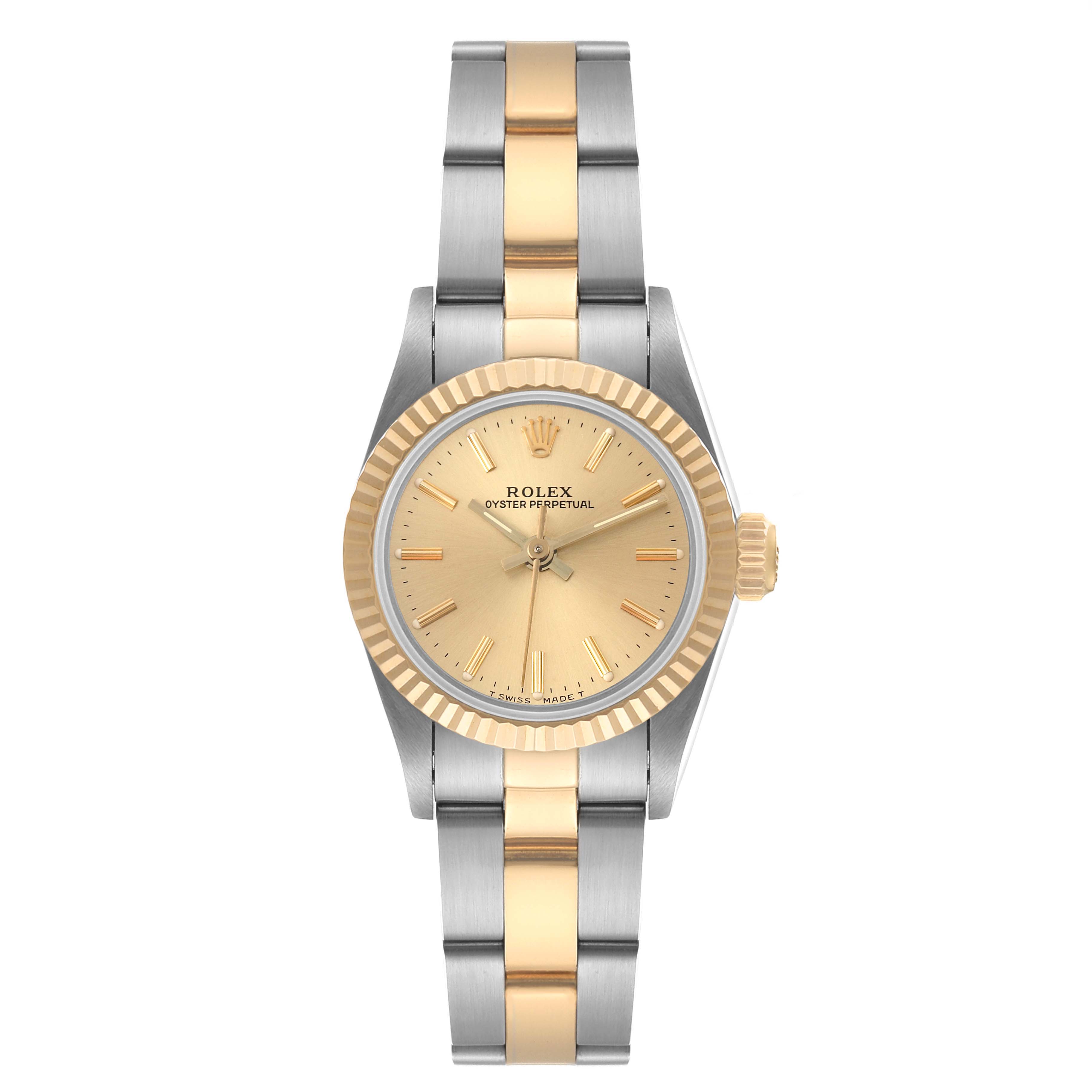 The image shows a Rolex Oyster Perpetual 67193 Women
s Steel and Gold (two tone) Champagne Dial 67193 Women
s Steel and Gold (two tone) Champagne Dial watch viewed from the front, highlighting its face, bezel, and two-tone bracelet.