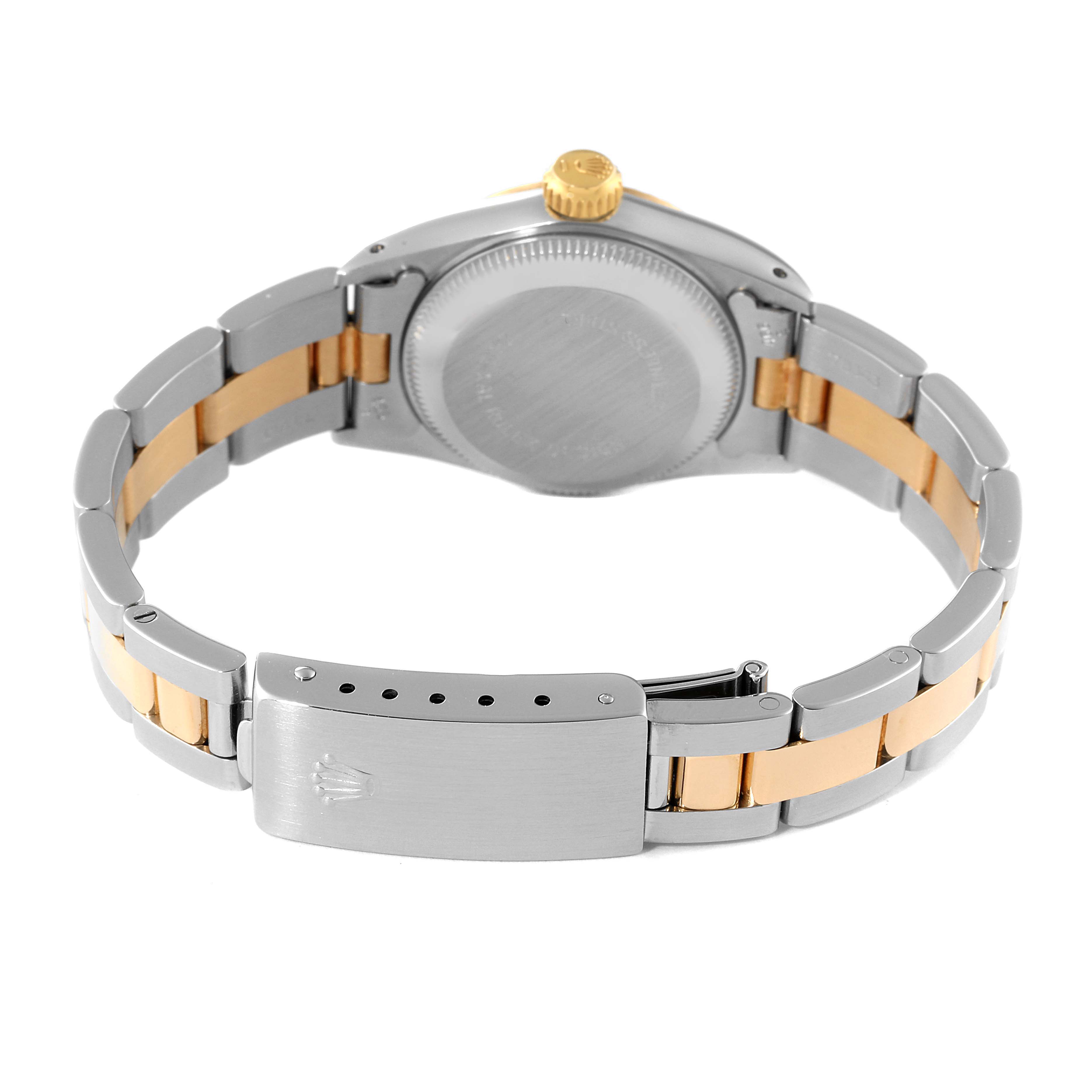 This image shows the back view of a Rolex Oyster Perpetual 67193 Women
s Steel and Gold (two tone) Champagne Dial 67193 Women
s Steel and Gold (two tone) Champagne Dial watch, highlighting the bracelet and the clasp.