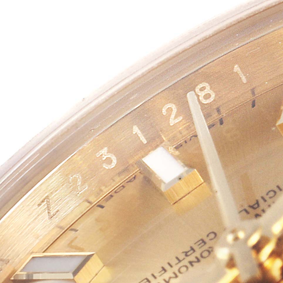 This close-up image shows the dial and part of the bezel of a Rolex President 179298 Women
s Yellow Gold Champagne Dial 179298 Women
s Yellow Gold Champagne Dial model watch.