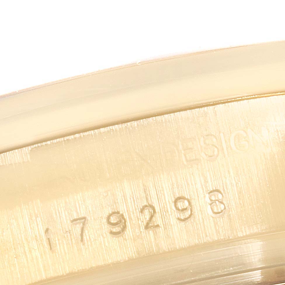 The image shows a close-up of the case back edge of a Rolex President 179298 Women
s Yellow Gold Champagne Dial 179298 Women
s Yellow Gold Champagne Dial model watch, featuring the model number "179298."