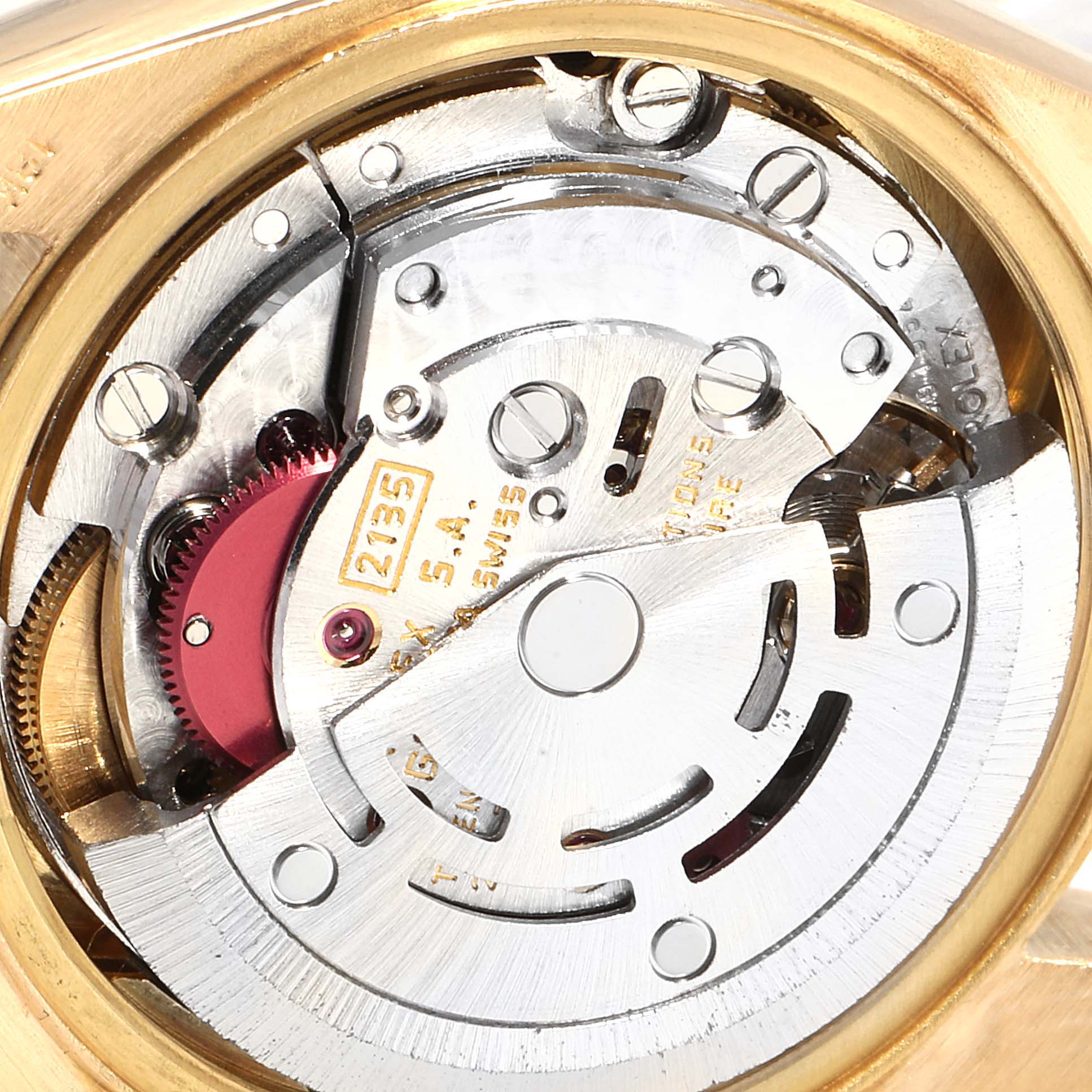 The image shows a close-up view of the movement mechanism inside a Rolex President 79188 Women
s Yellow Gold Mother of Pearl Dial 79188 Women
s Yellow Gold Mother of Pearl Dial model watch.