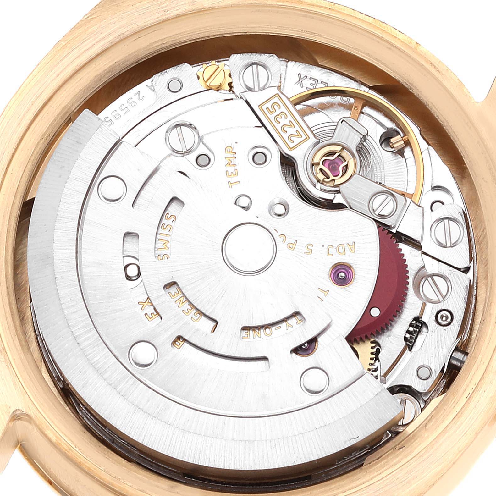 This image shows a close-up of the internal movement mechanism of a Rolex President 179158 Women
s Yellow Gold Champagne Dial 179158 Women
s Yellow Gold Champagne Dial model watch.