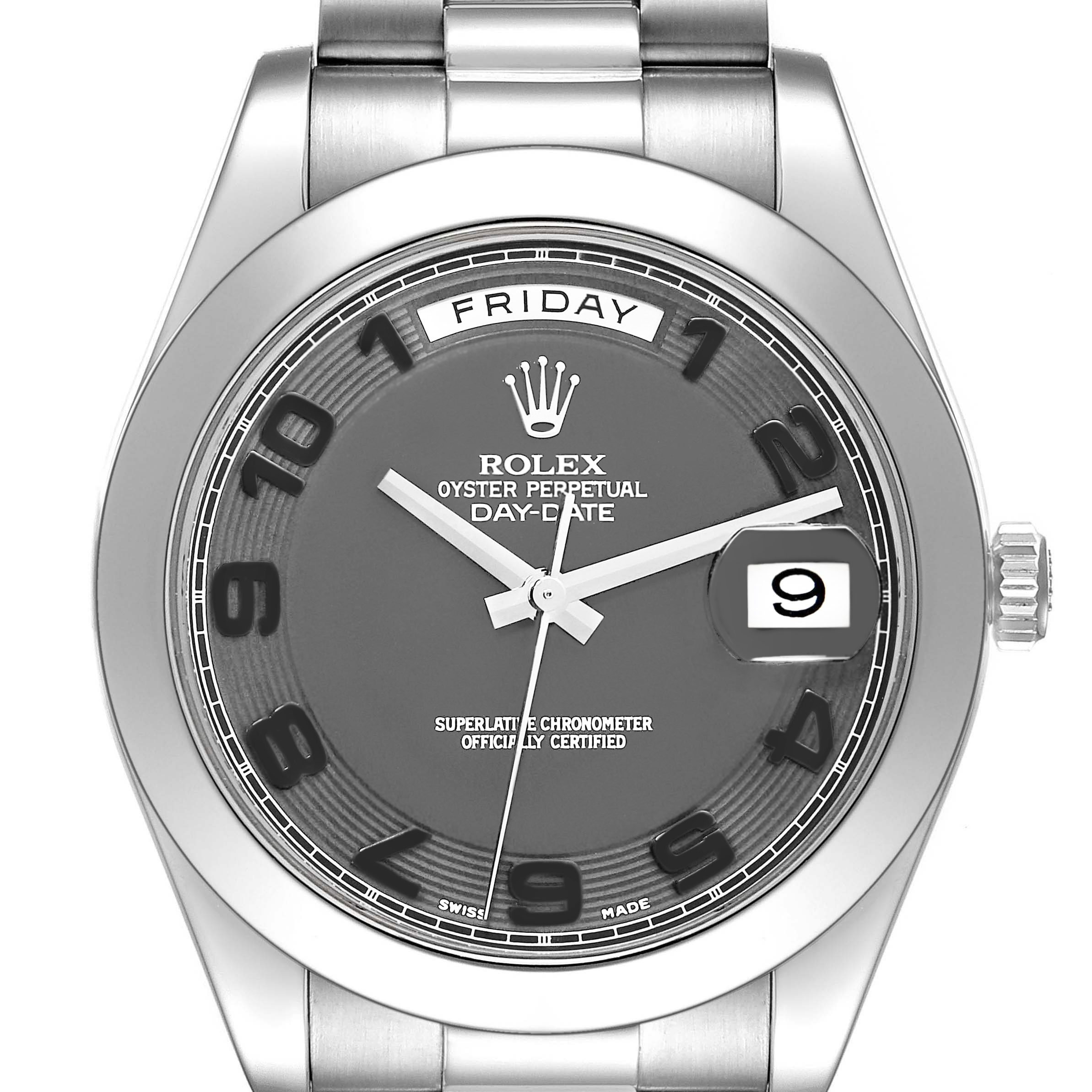 The Rolex President 218206 Men's Platinum Black Dial 218206 Men's Platinum Black Dial watch is shown from a front angle, displaying the dial, bezel, day, and date features.