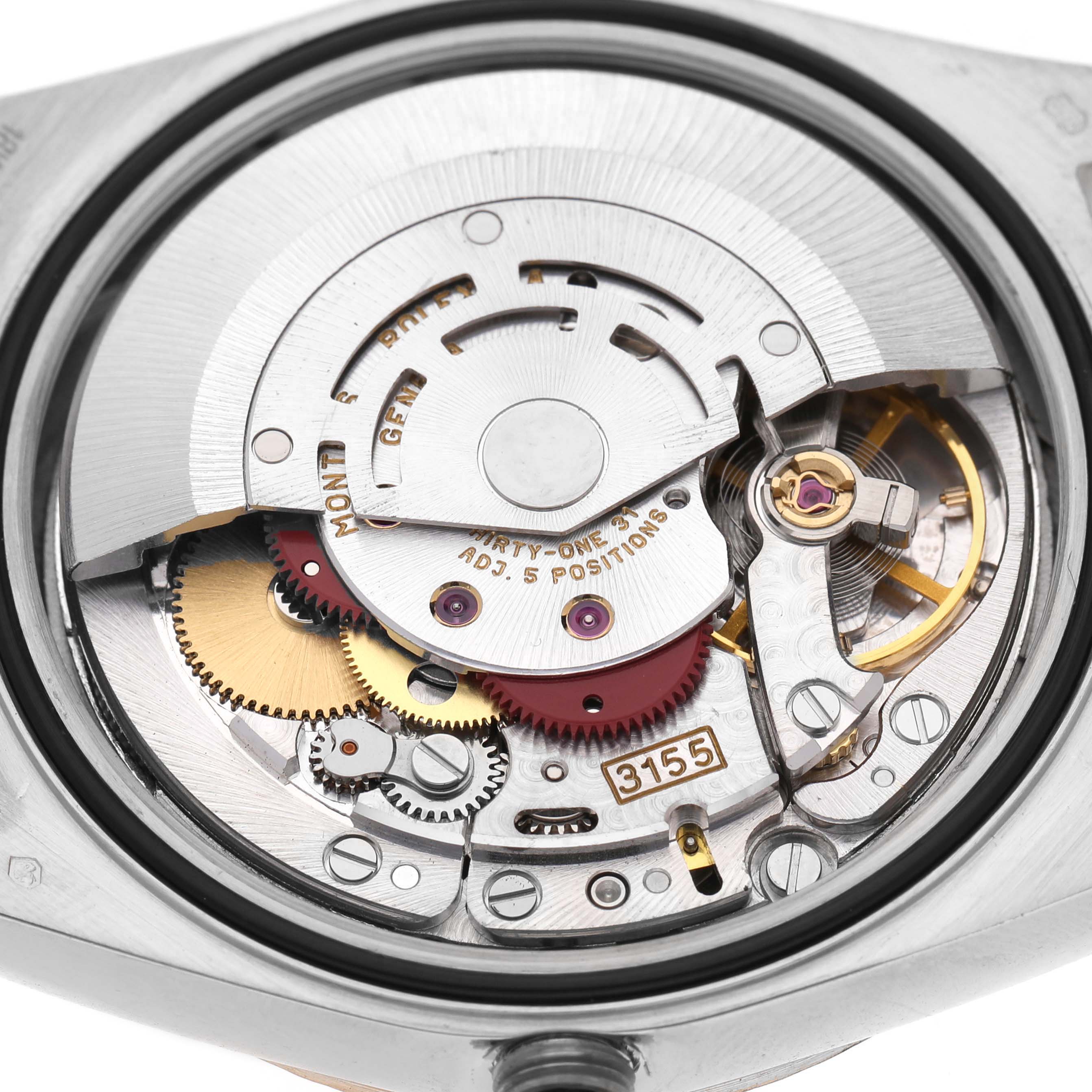 The image shows the internal mechanism of a Rolex President 18239 Men's White Gold Silver Dial model from a rear angle, highlighting gears and the rotor.
