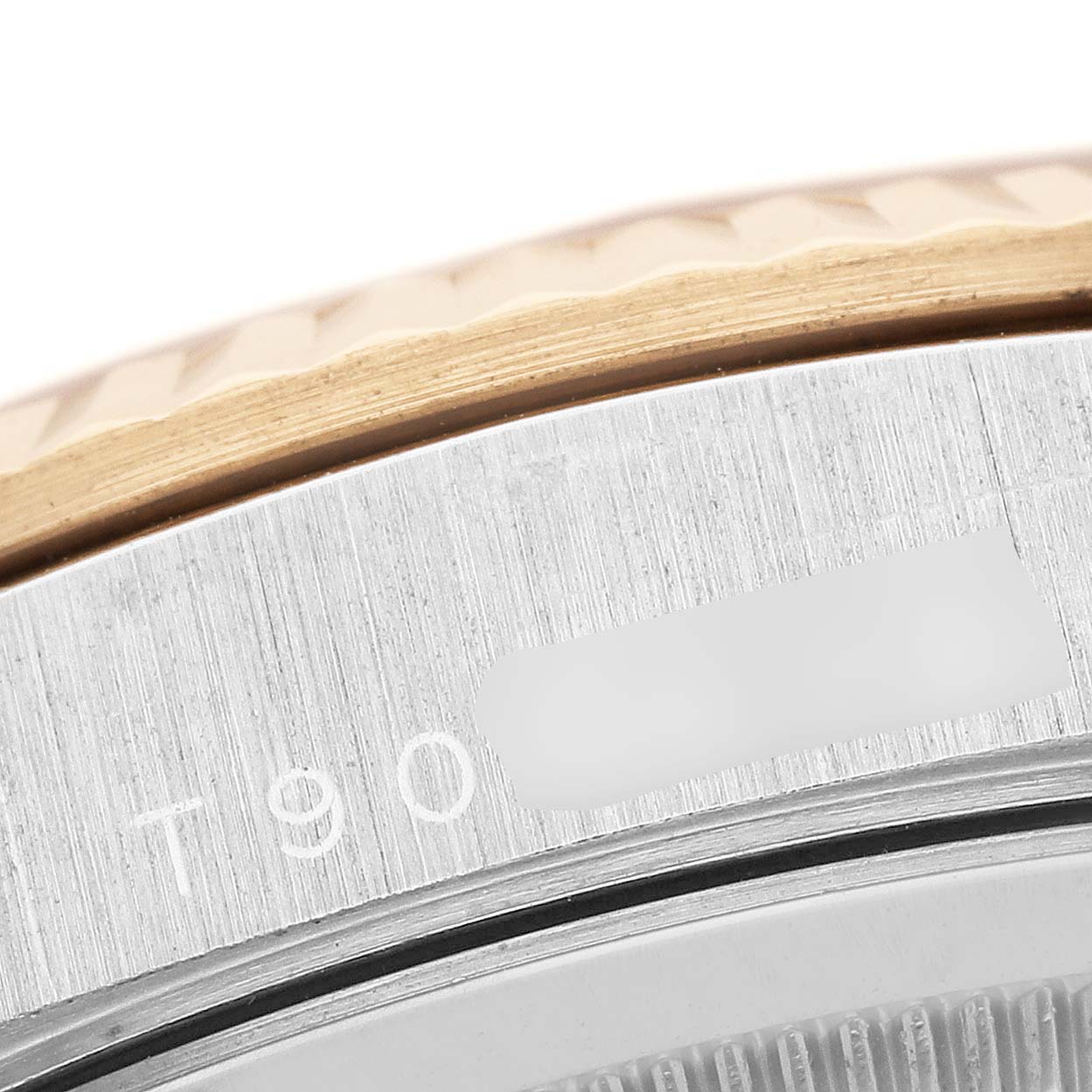 The image shows a close-up of the bezel and case edge of a Rolex President 18239 Men's White Gold Silver Dial model, highlighting the fluted design and part of the serial number.