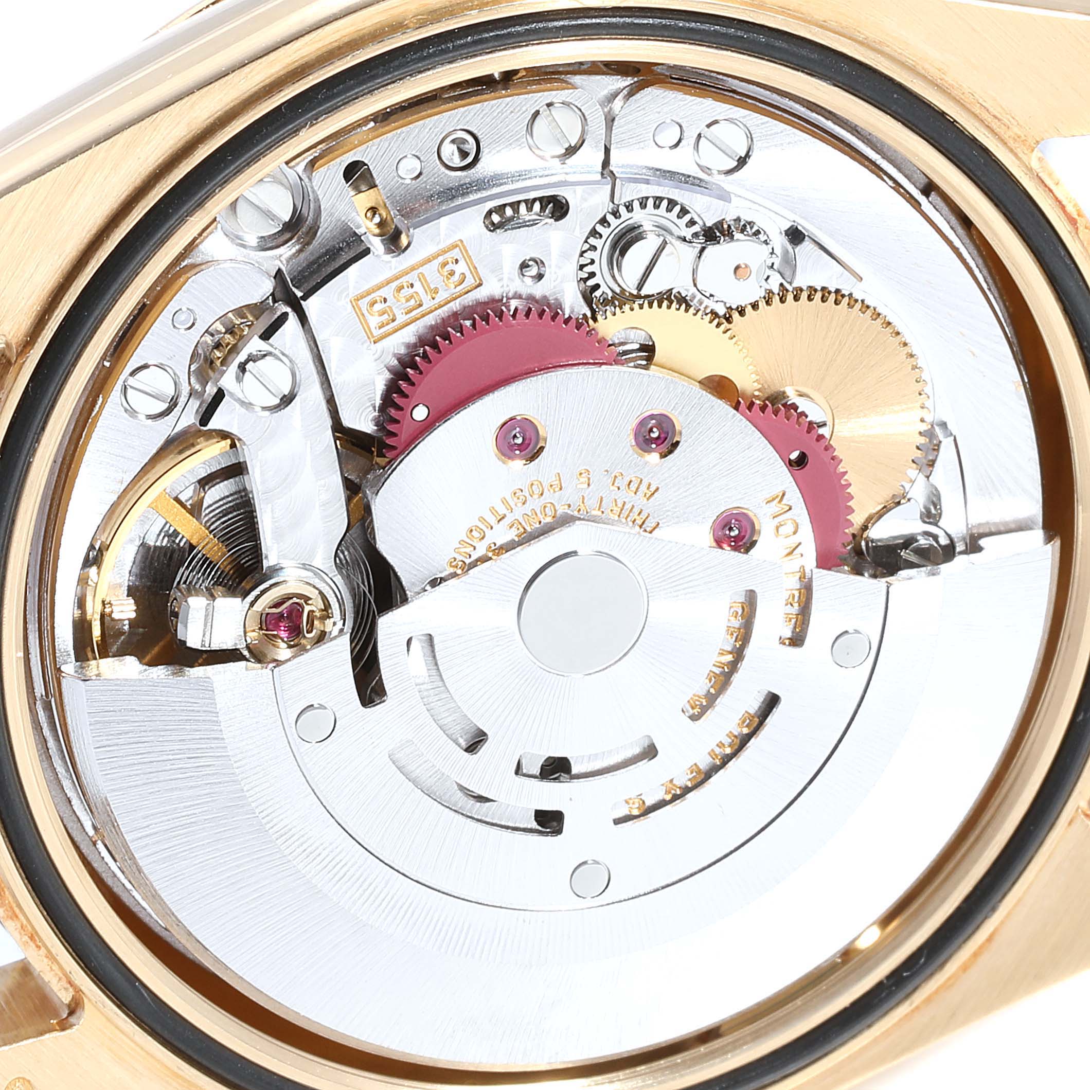 This image shows the intricate inner mechanisms of a Rolex President 118338 Men
s Yellow Gold Champagne Dial 118338 Men
s Yellow Gold Champagne Dial model watch viewed from the back.
