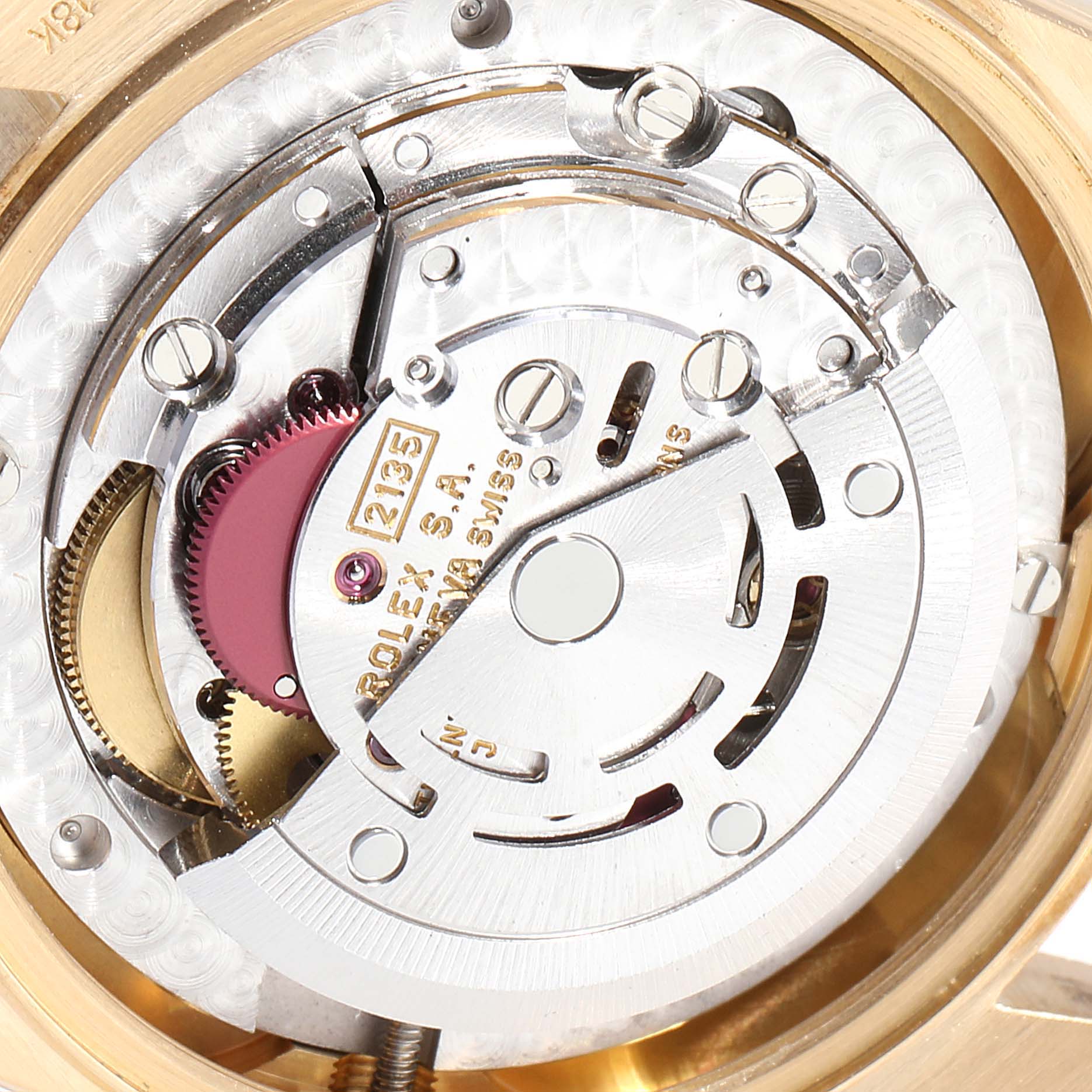 The image shows the intricate internal mechanism of a Rolex President 68278 Women
s Yellow Gold Champagne Dial 68278 Women
s Yellow Gold Champagne Dial model from the back.