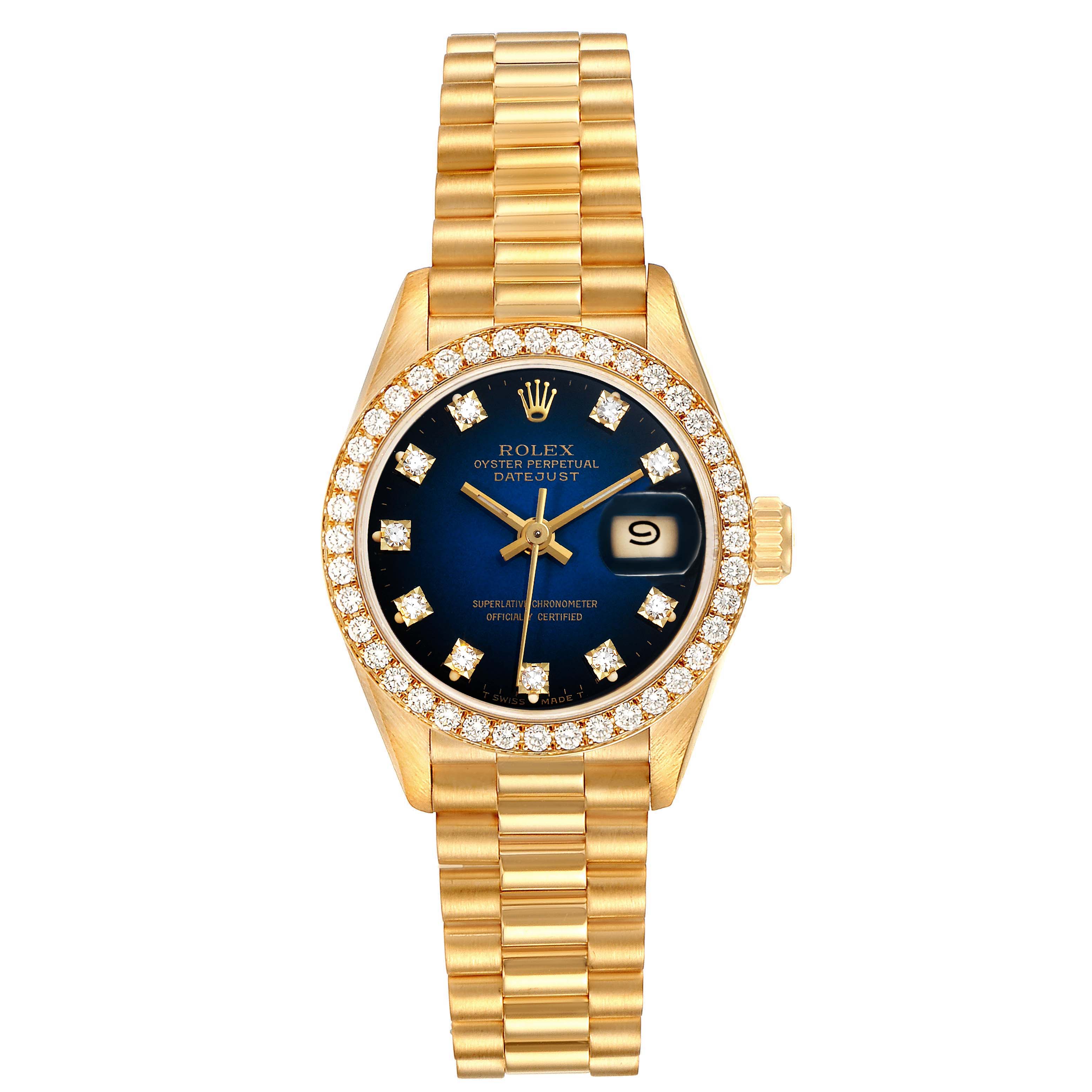 This is a frontal view of a Rolex President 69138 Women's Yellow Gold Blue Dial 69138 Women's Yellow Gold Blue Dial model watch, featuring a gold band, a blue dial, and a diamond-encrusted bezel.