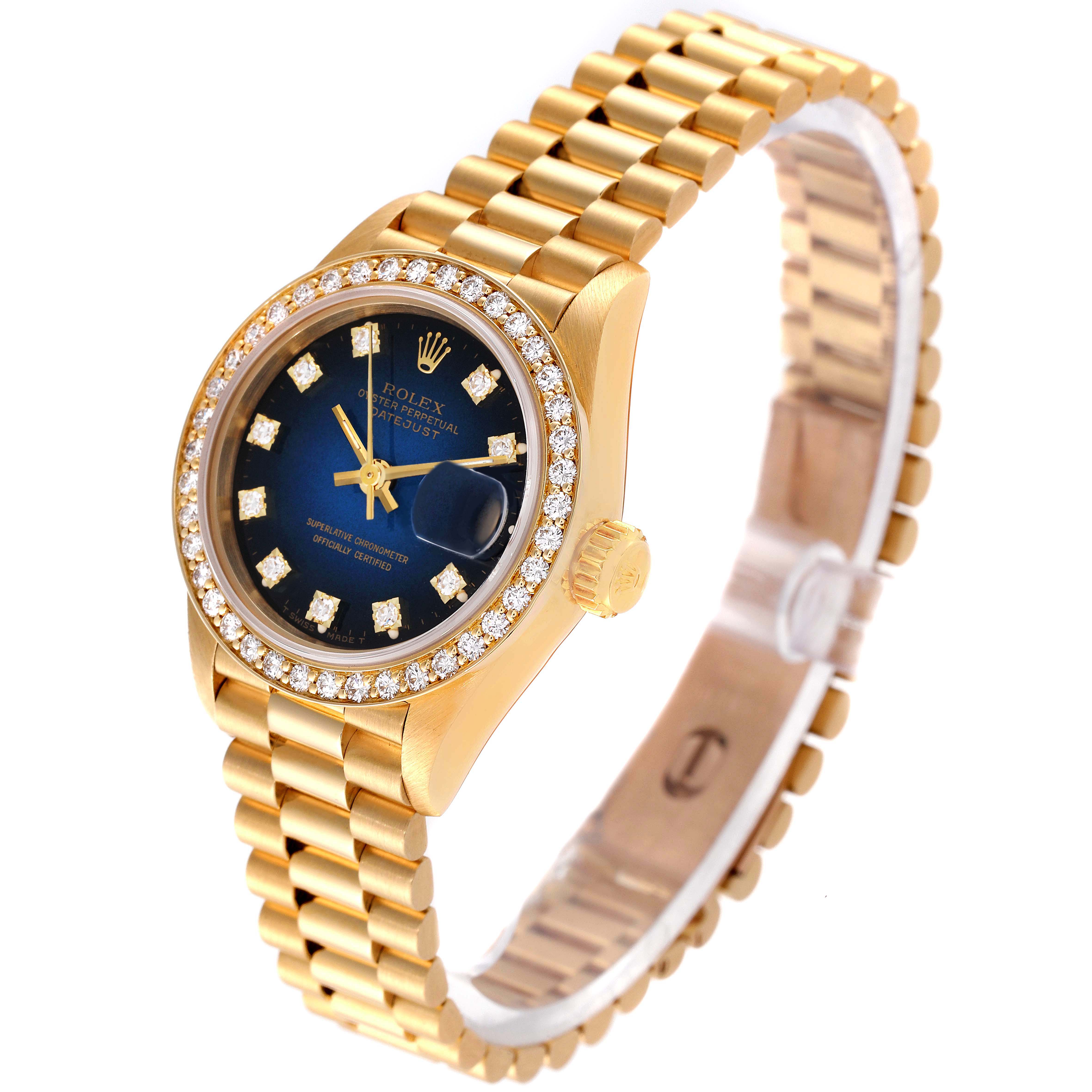 This image shows a gold Rolex President 69138 Women's Yellow Gold Blue Dial 69138 Women's Yellow Gold Blue Dial watch with a diamond-studded bezel and blue dial, angled slightly to the side.