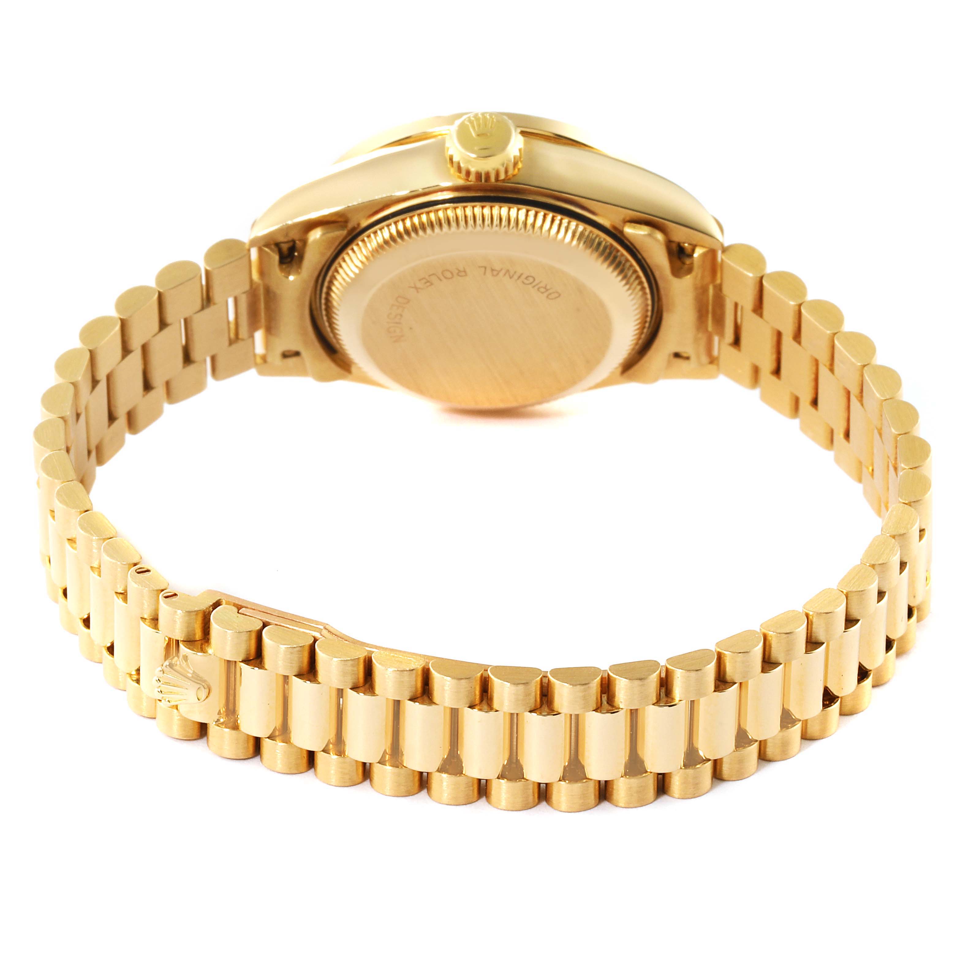 This image shows the back case and bracelet of the Rolex President 69138 Women's Yellow Gold Blue Dial 69138 Women's Yellow Gold Blue Dial model watch from a rear angle.