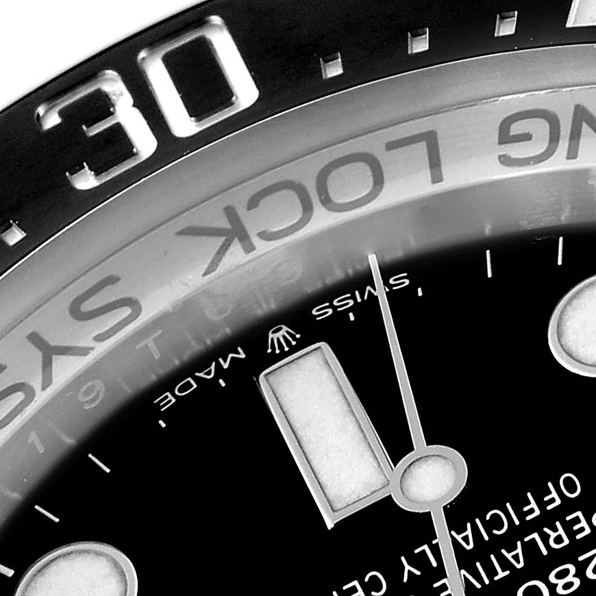 The image shows a close-up of the dial, hour markers, minute hand, and part of the bezel of a Rolex Sea-Dweller 126660 Men
s Stainless Steel Black Dial 126660 Men
s Stainless Steel Black Dial watch.