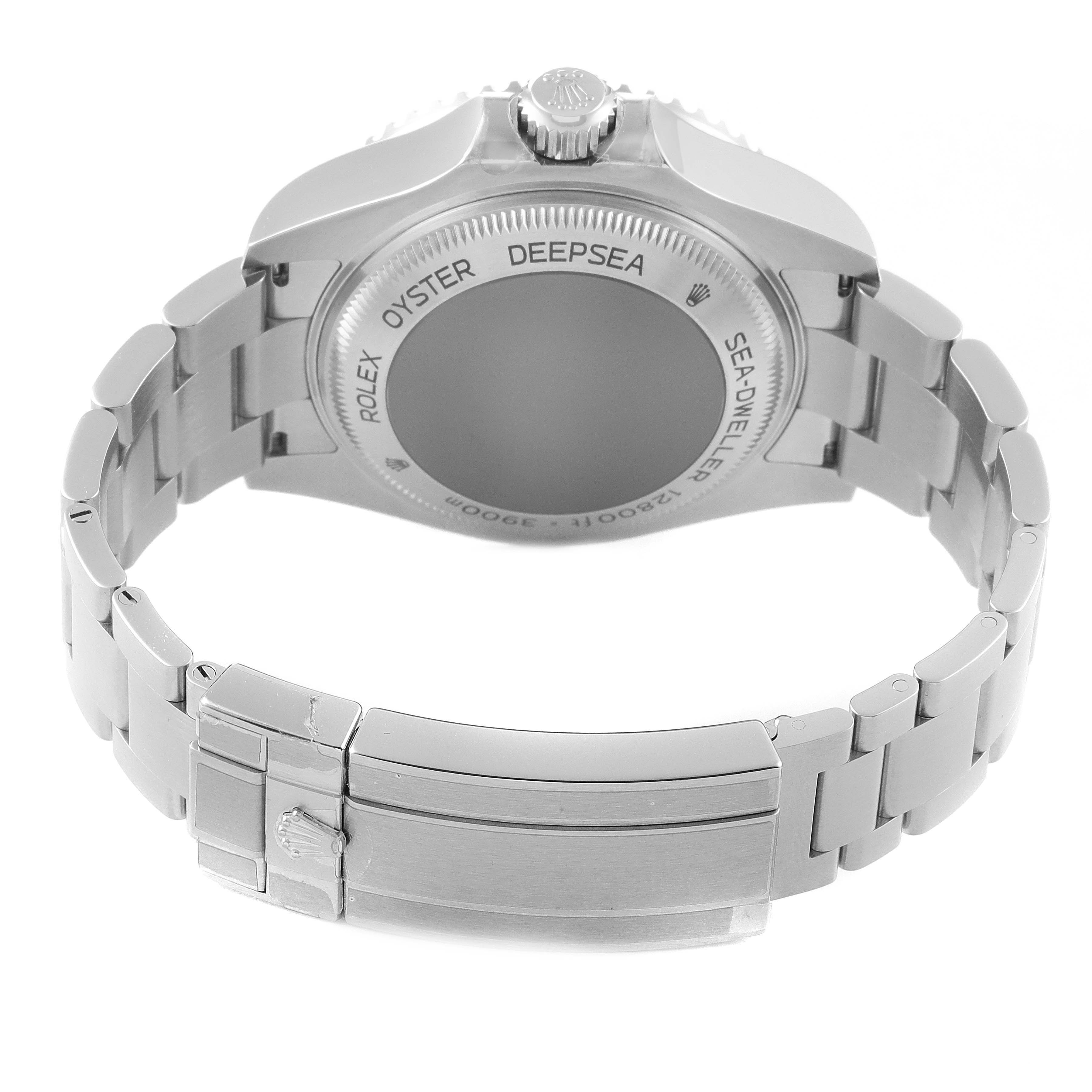 The image shows the back case and bracelet of a Rolex Sea-Dweller 126660 Men
s Stainless Steel Blue Dial 126660 Men
s Stainless Steel Blue Dial watch, specifically highlighting the case back engravings.