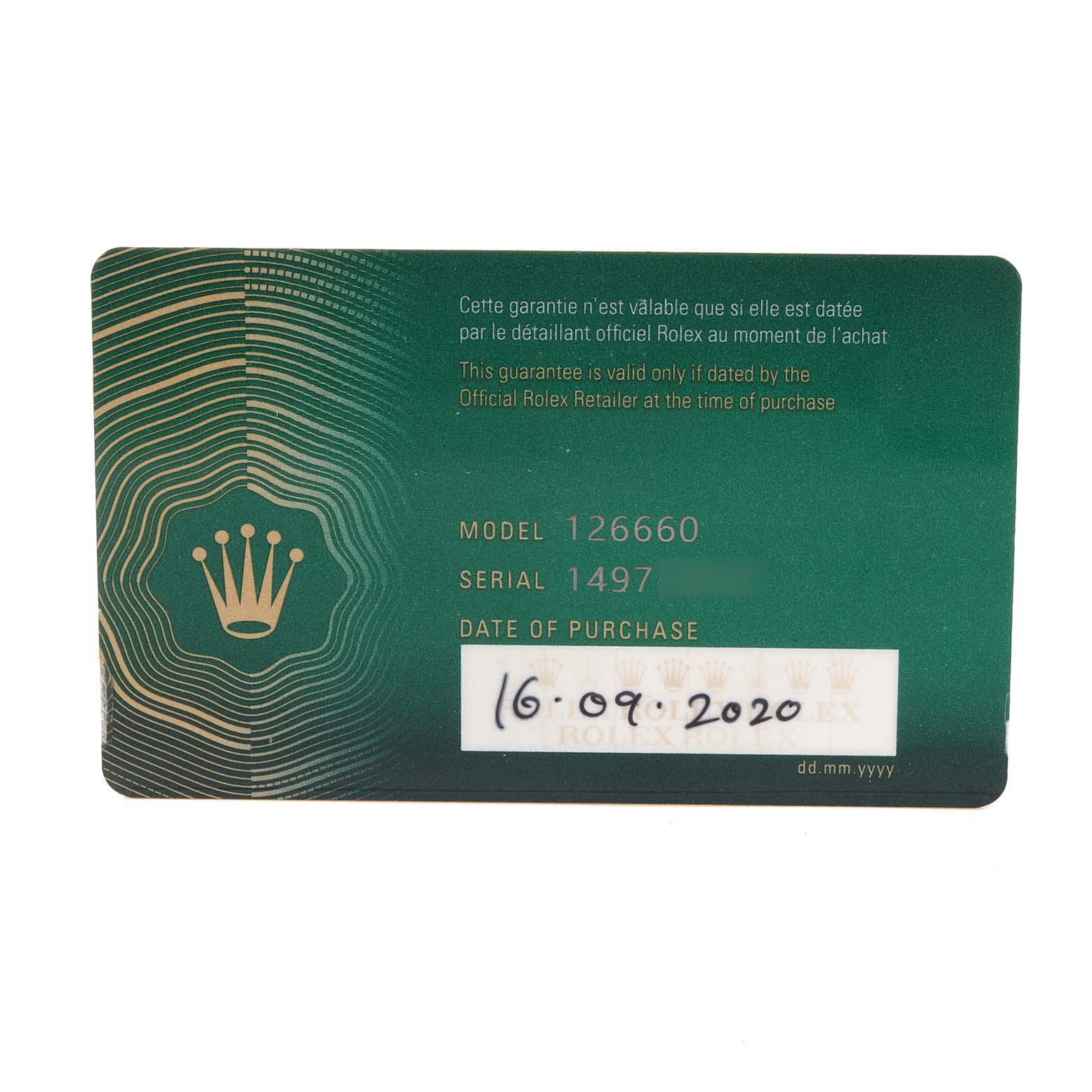 This image shows a guarantee card for the Rolex Sea-Dweller 126660 Men
s Stainless Steel Blue Dial 126660 Men
s Stainless Steel Blue Dial model 126660 with purchase details.