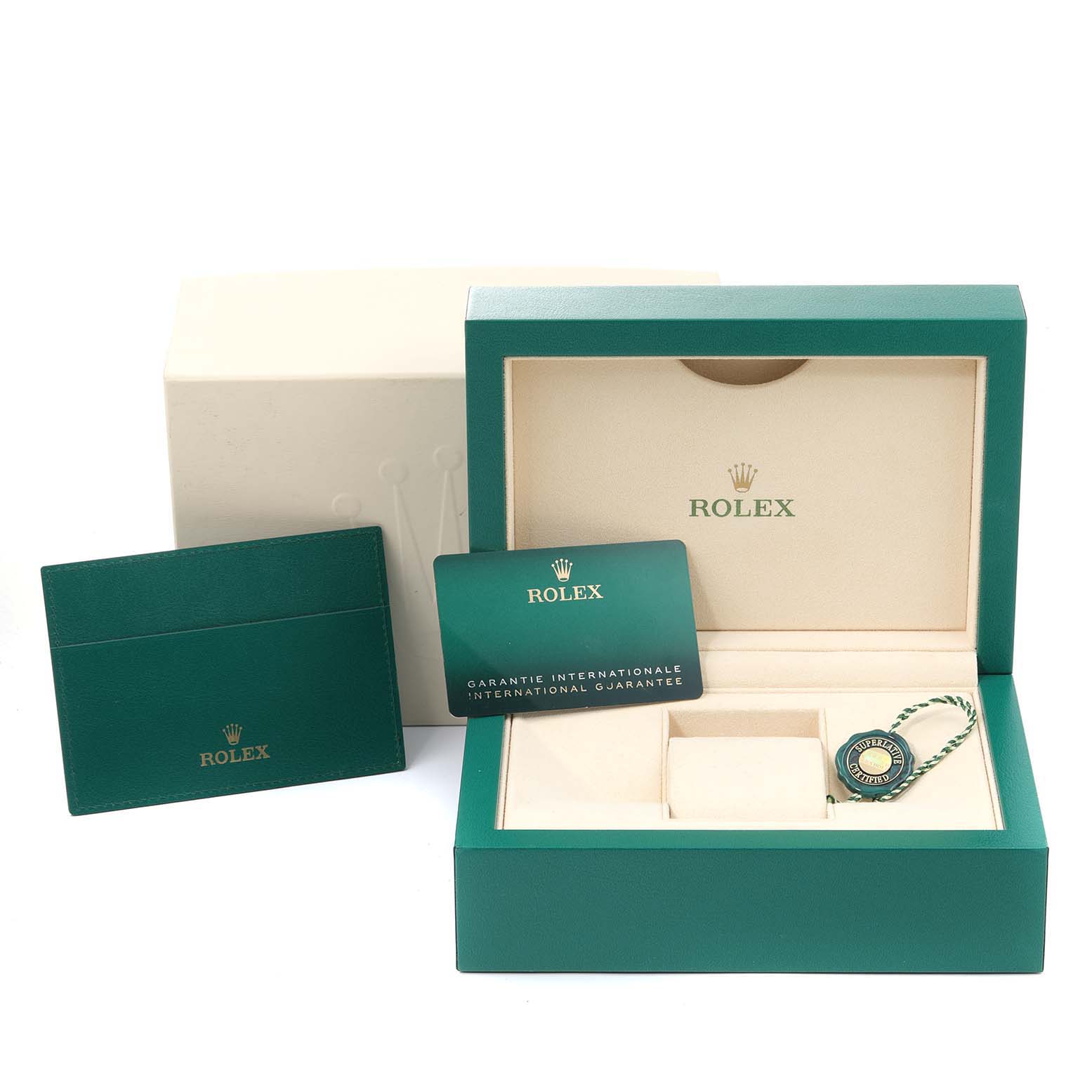The image shows the packaging for a Rolex Sea-Dweller 126660 Men
s Stainless Steel Blue Dial 126660 Men
s Stainless Steel Blue Dial, including an open box, warranty card, card holder, and a tag inside.