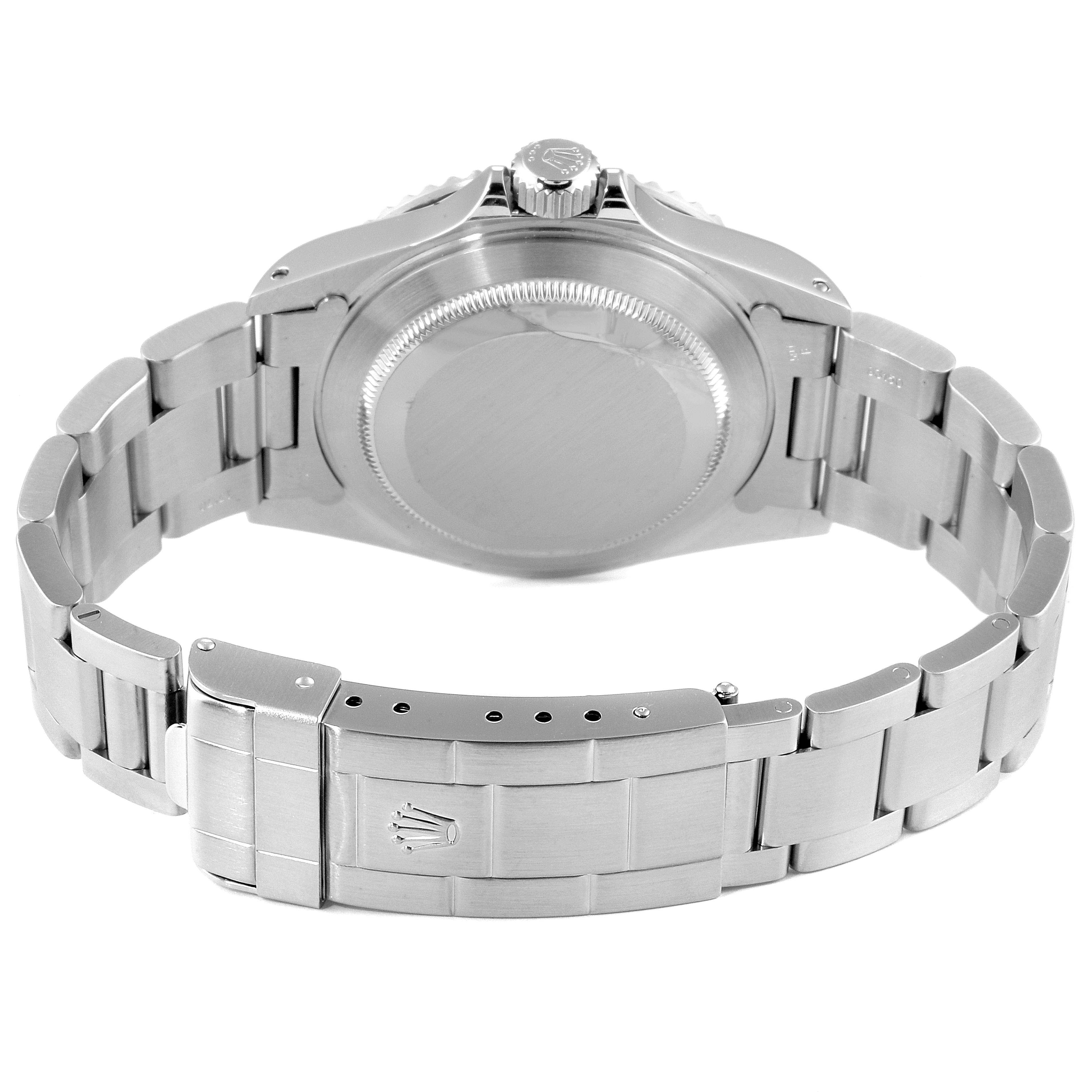 The image shows the back case and bracelet clasp of a Rolex Submariner 14060M Men
s Stainless Steel Black Dial 14060M Men
s Stainless Steel Black Dial watch.