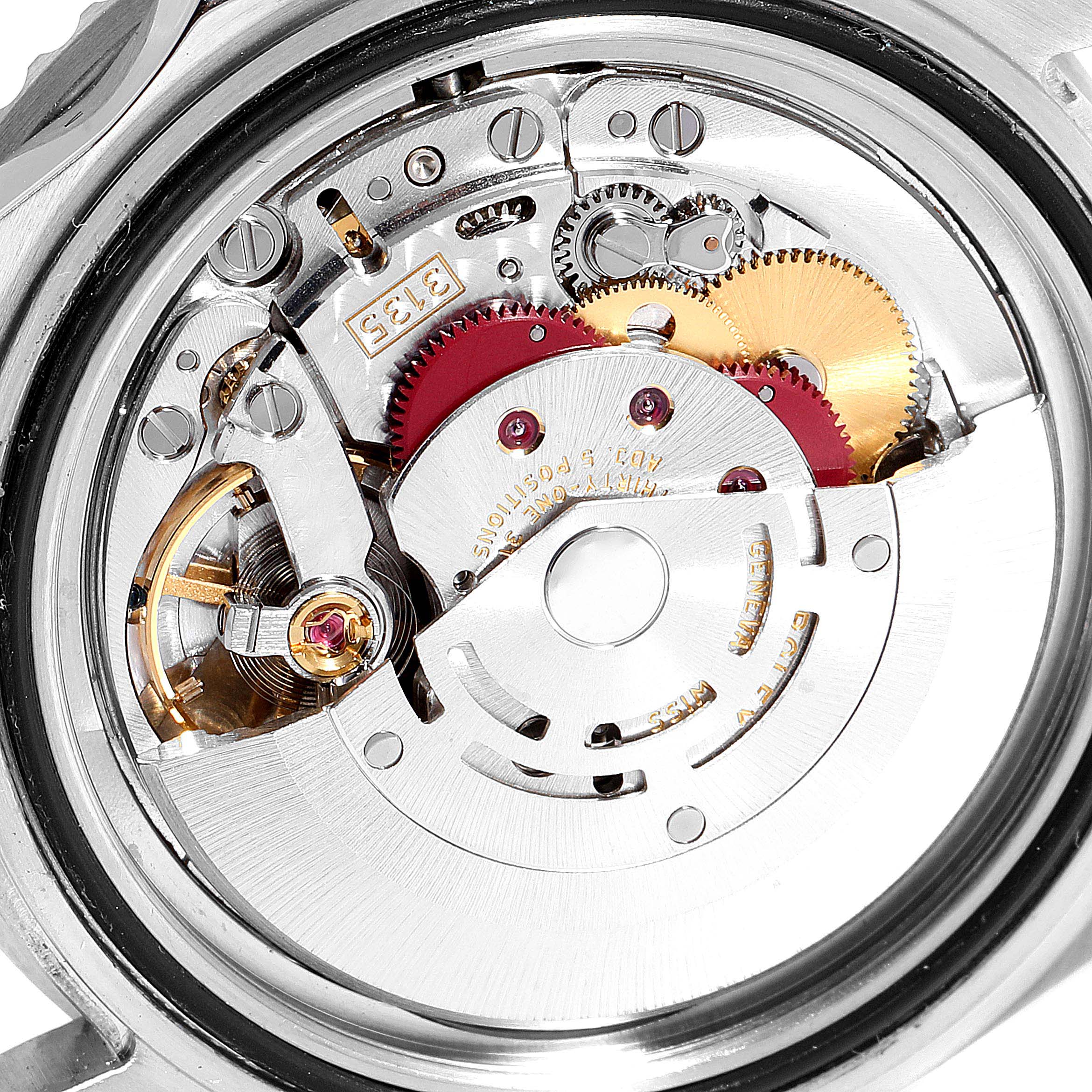 This image shows a close-up view of the movement mechanism of a Rolex Submariner 16610LV Men's Stainless Steel Black Dial 16610LV Men's Stainless Steel Black Dial watch. 