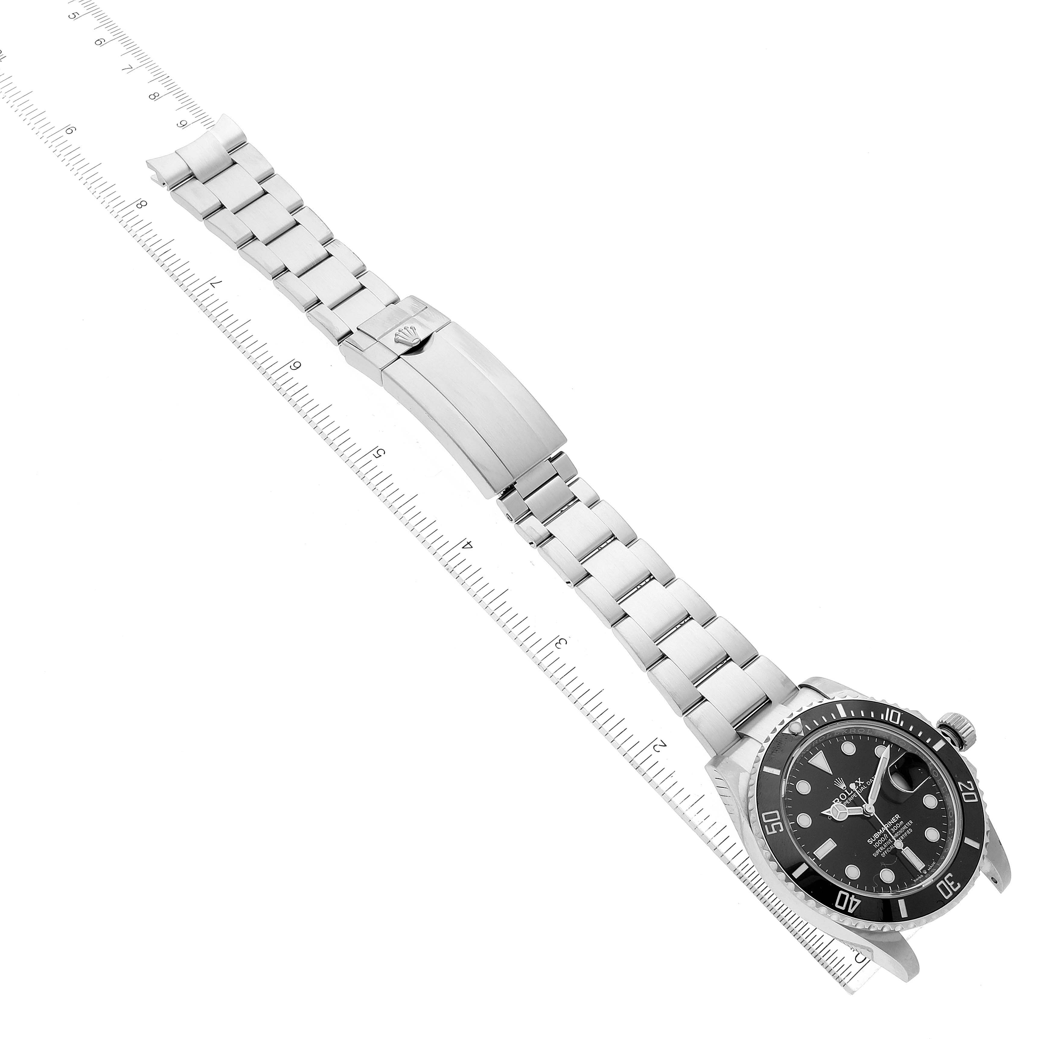 The image shows a top-down view of a Rolex Submariner 126610 Men
s Stainless Steel Black Dial 126610 Men
s Stainless Steel Black Dial watch, displaying the dial, bezel, and bracelet with clasp.