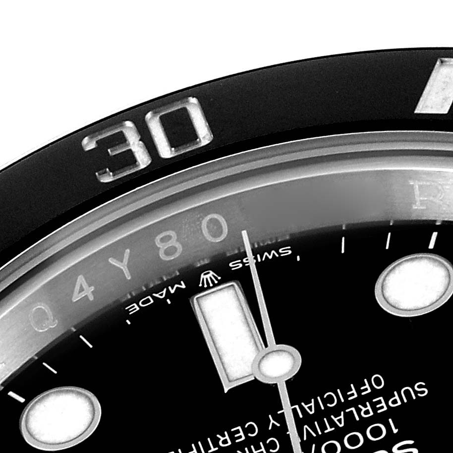 The image shows a close-up of the dial and bezel of a Rolex Submariner 126610 Men
s Stainless Steel Black Dial 126610 Men
s Stainless Steel Black Dial, displaying parts of the minute markers and text.
