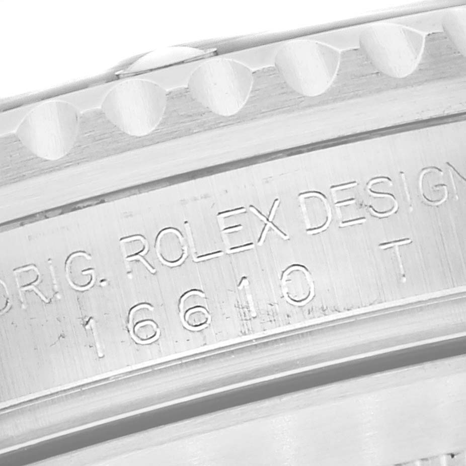 This image shows a close-up angle of the engraved model number "16610" on a Rolex Submariner 16610LV Men's Stainless Steel Black Dial 16610LV Men's Stainless Steel Black Dial watch.
