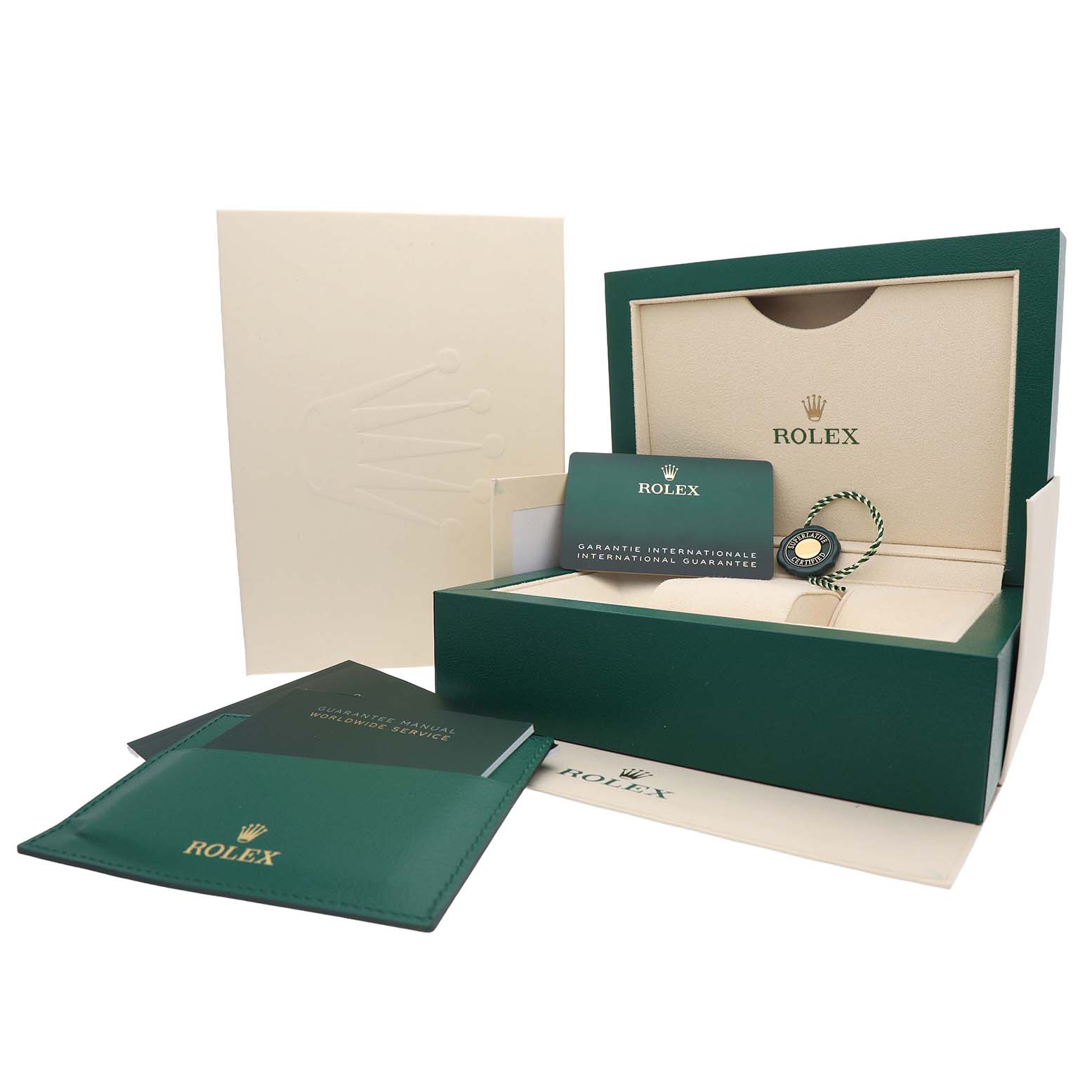 The image shows the accessories for a Rolex Submariner M124060-0001 Men's Stainless Steel Black Dial, including the box, guarantee card, and manuals, viewed from the front.