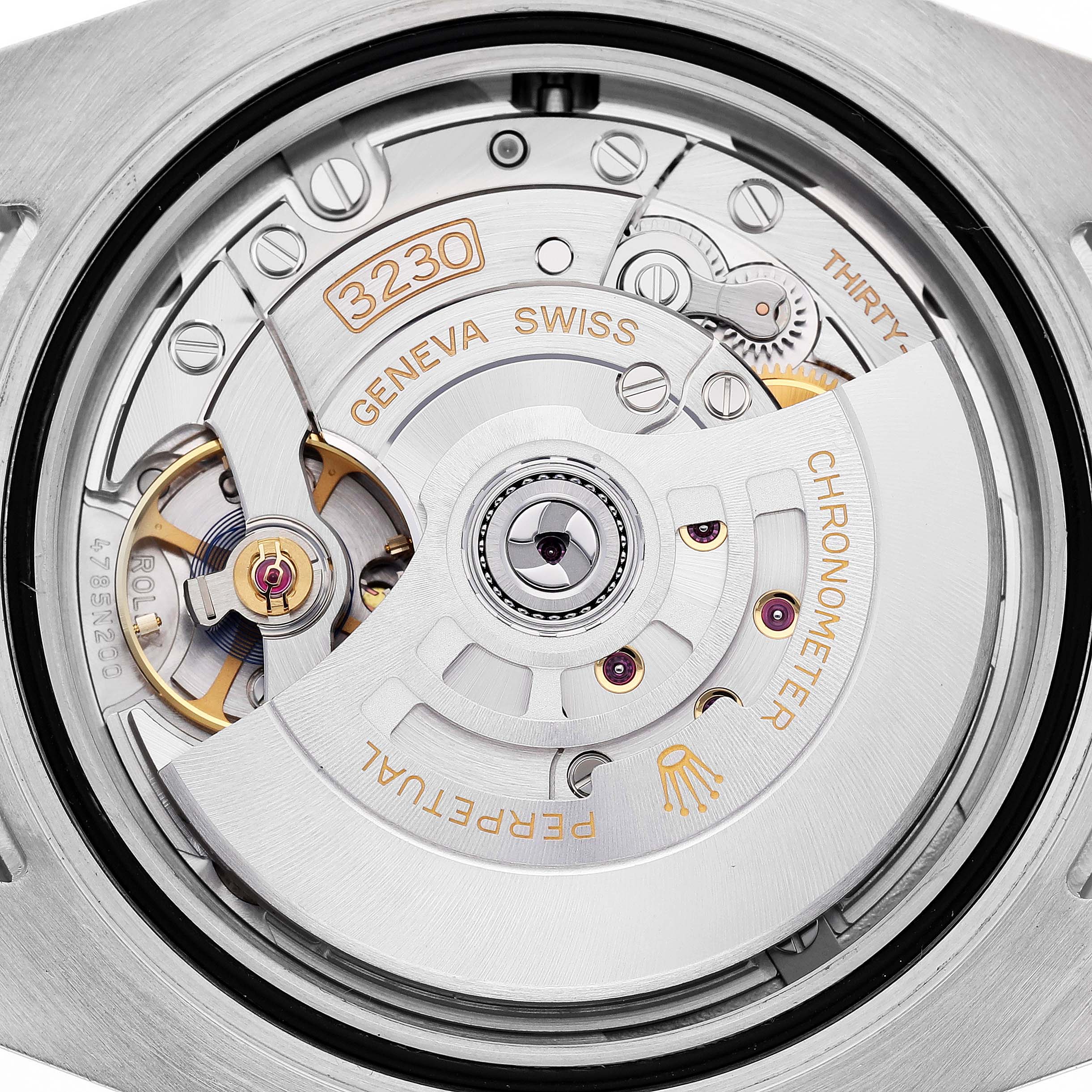 The image shows the movement of the Rolex Submariner M124060-0001 Men's Stainless Steel Black Dial, highlighting the rotor and various mechanical components from the back.