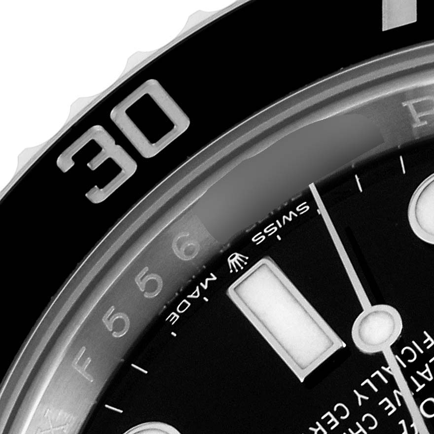 This close-up image shows the bezel, part of the dial, and indices of a Rolex Submariner 124060 Men's Stainless Steel Black Dial 124060 Men's Stainless Steel Black Dial watch.