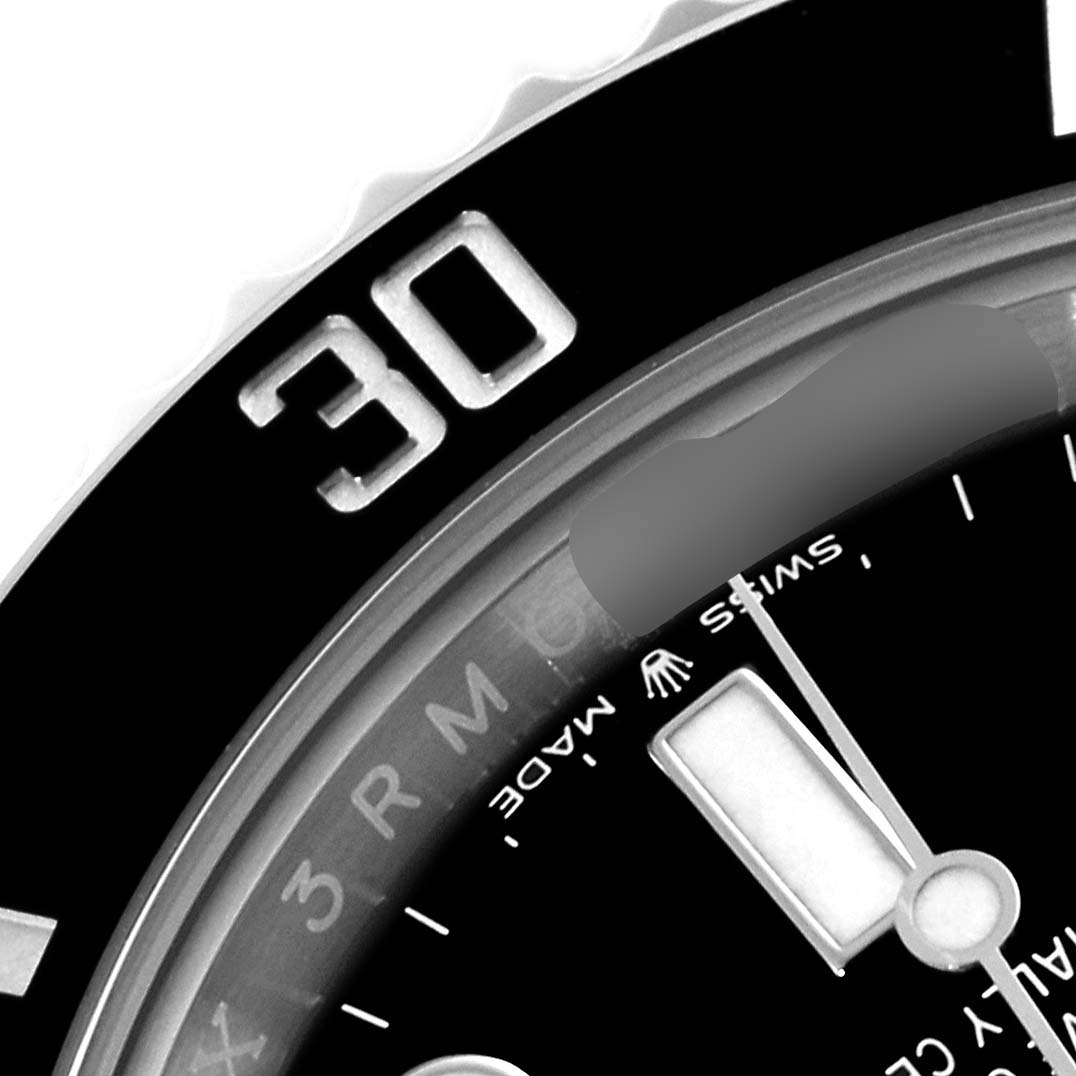 The image shows a close-up of the 30-minute marker and the watch face details of a Rolex Submariner 124060 Men
s Stainless Steel Black Dial 124060 Men
s Stainless Steel Black Dial model.