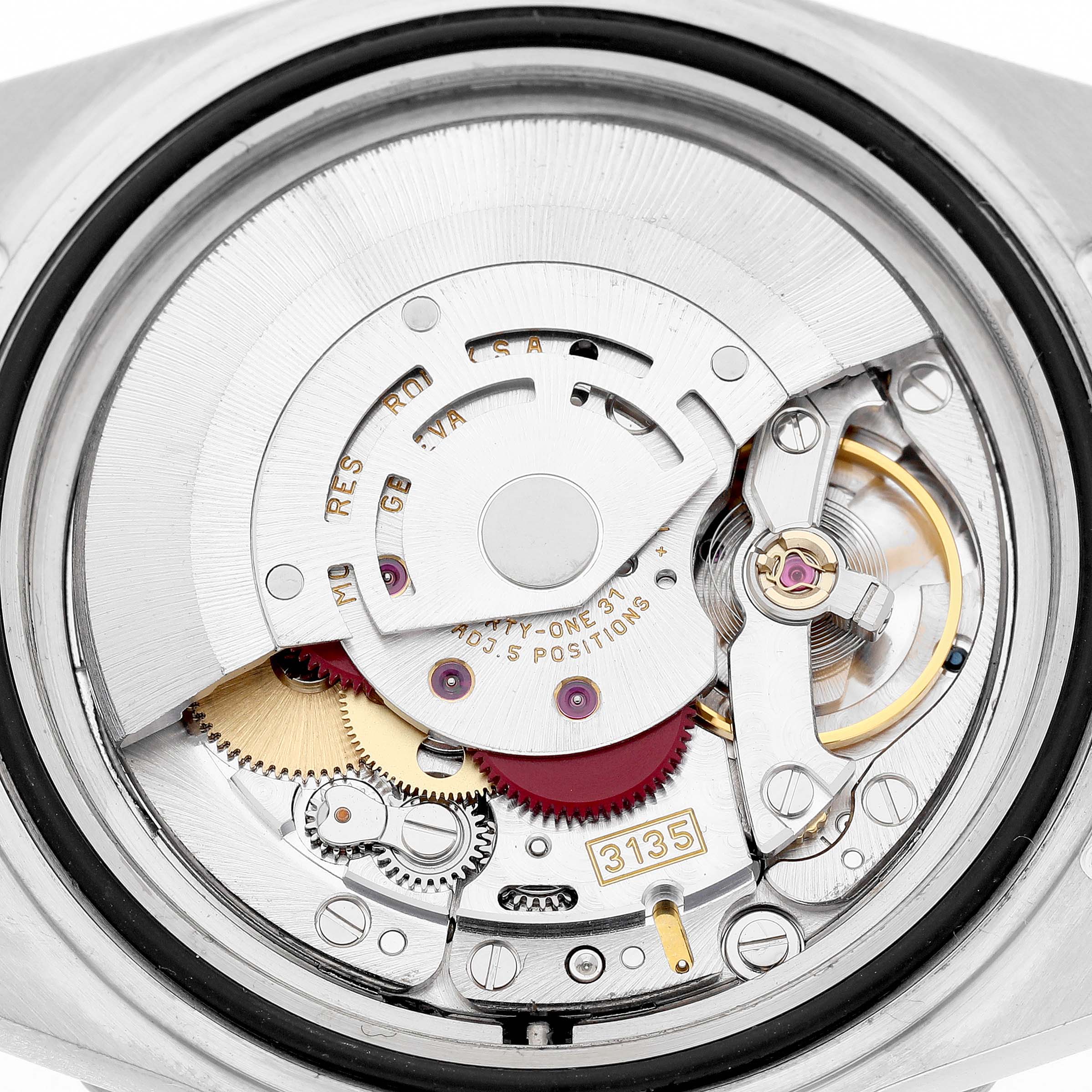 The image shows the movement of a Rolex Submariner 16613 Men's Steel and Gold (two tone) Blue Dial watch, focusing on the intricate internal components.