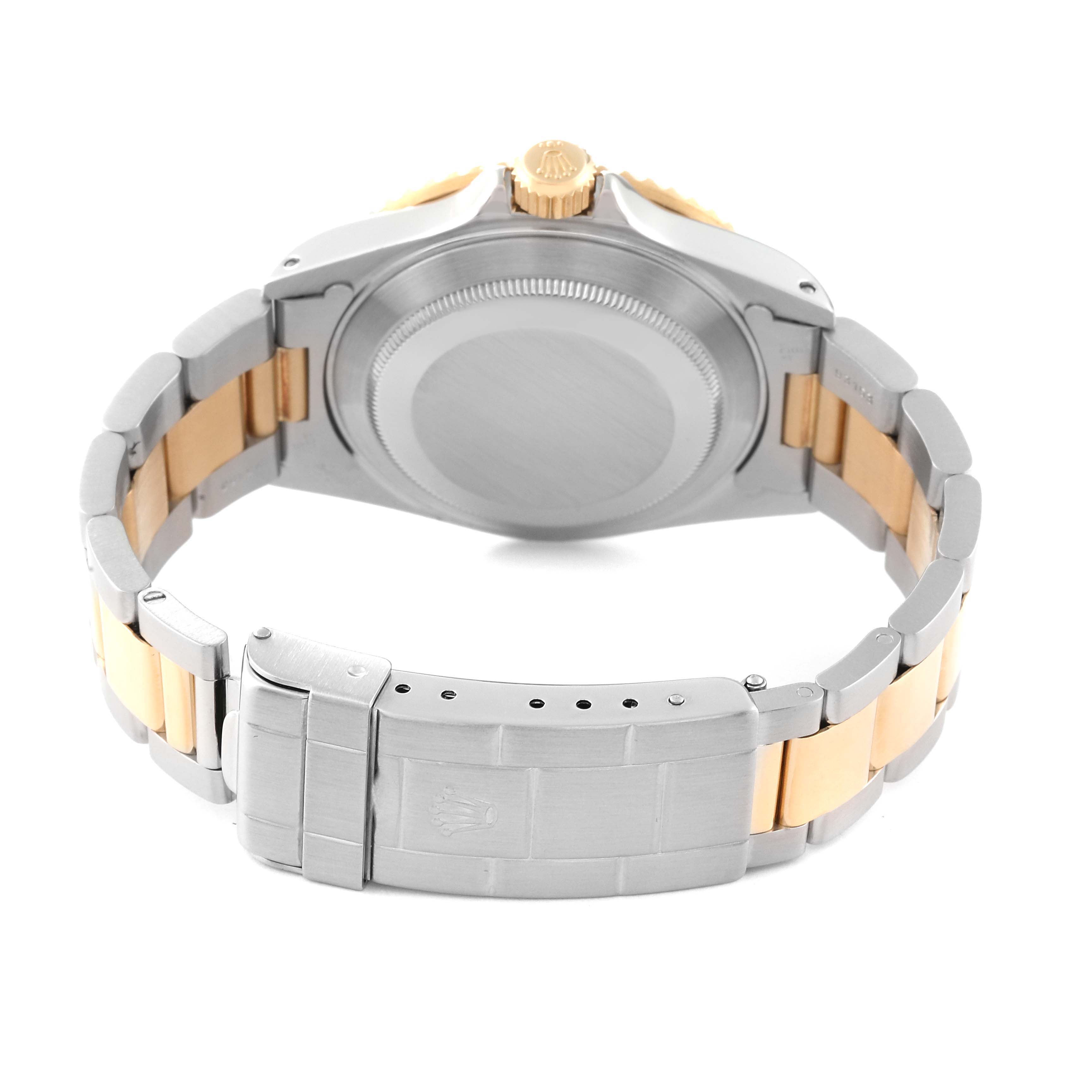 The image shows a rear view of the Rolex Submariner 16613 Men's Steel and Gold (two tone) Grey Dial 16613 Men's Steel and Gold (two tone) Grey Dial watch, highlighting the case back, bracelet, and clasp.