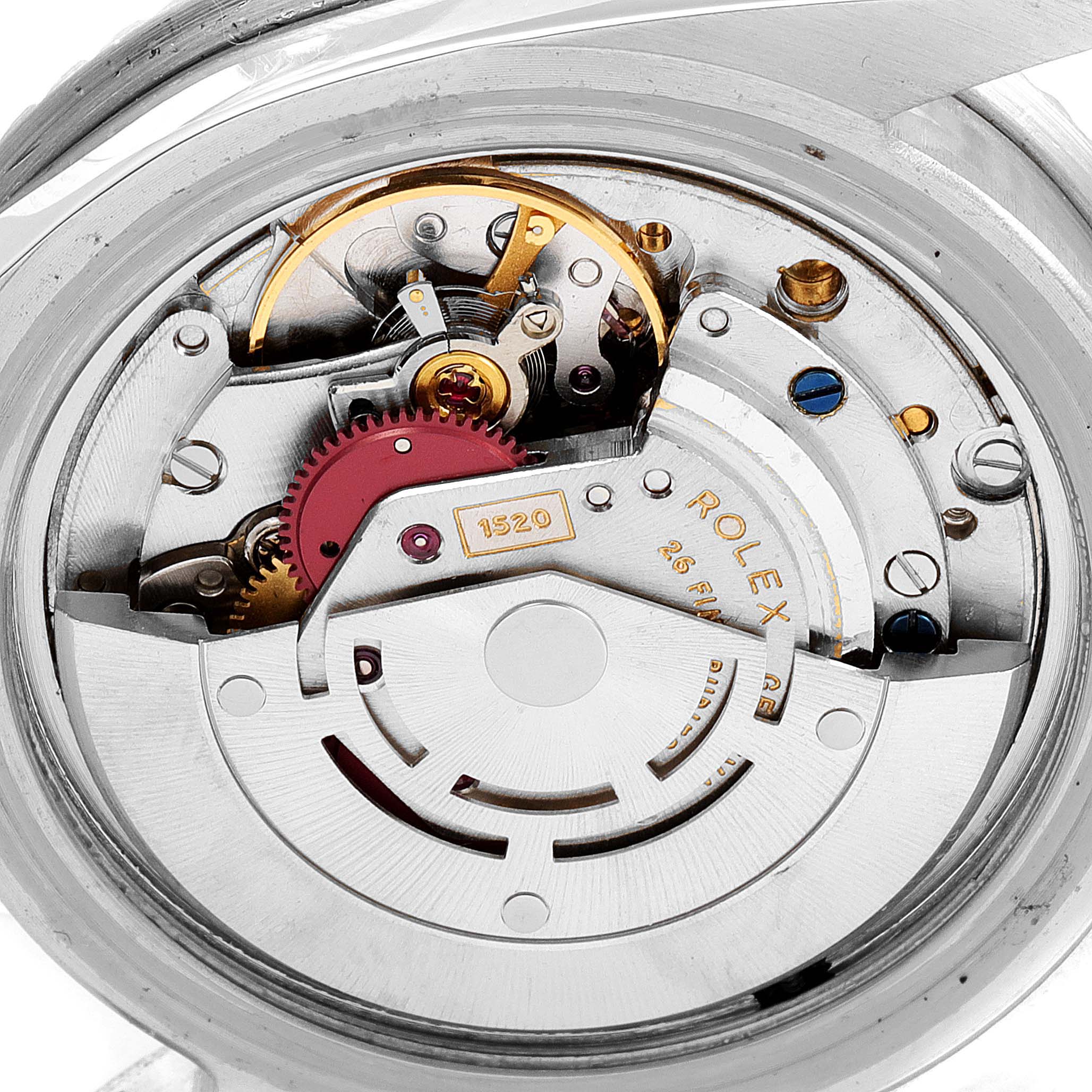 This is an internal view of a Rolex Submariner 5513 Men's Stainless Steel Black Dial 5513 Men's Stainless Steel Black Dial’s movement, showcasing its gears, balance wheel, and other intricate components.