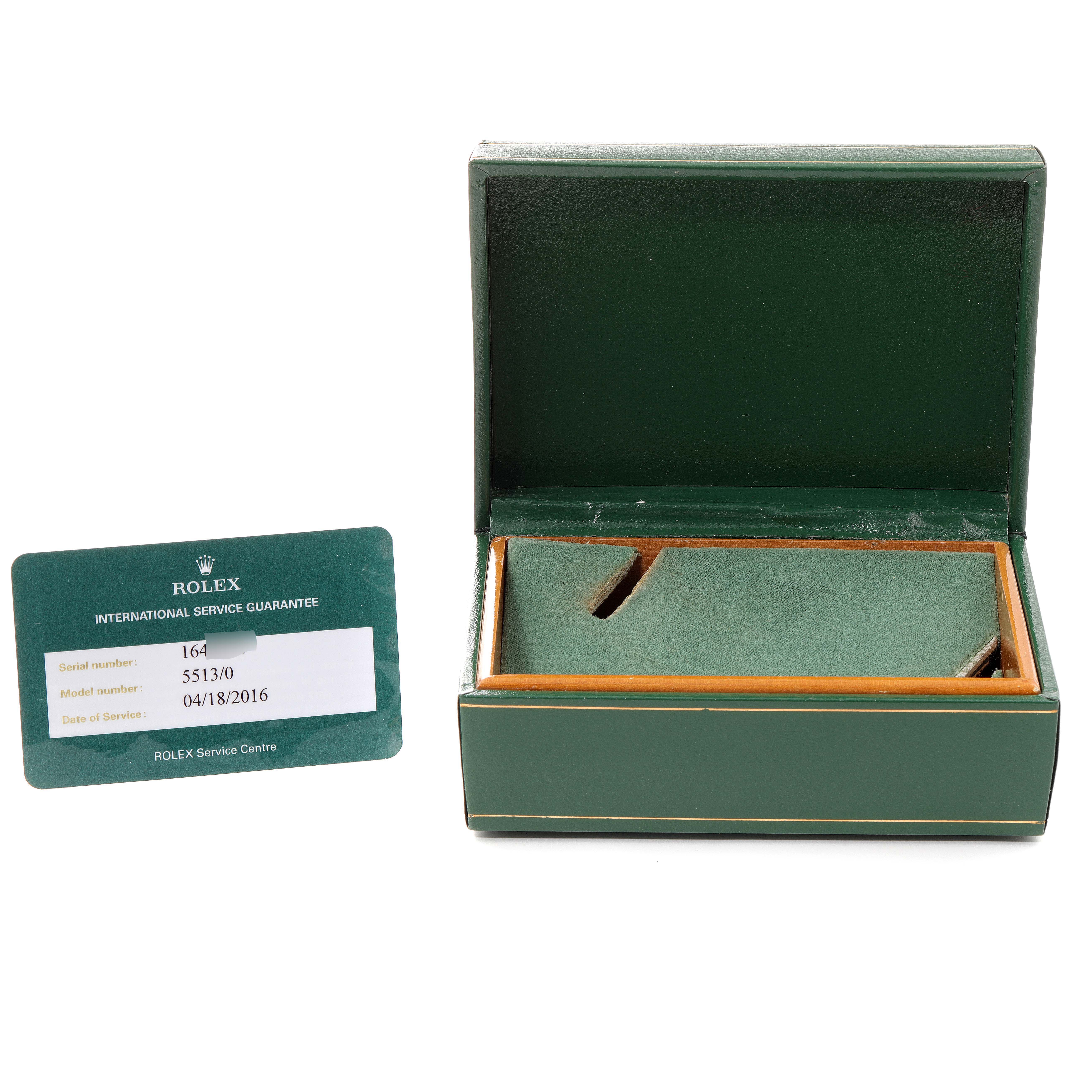The image shows an open green Rolex box and an international service guarantee card for the Rolex Submariner 5513 Men's Stainless Steel Black Dial 5513 Men's Stainless Steel Black Dial.