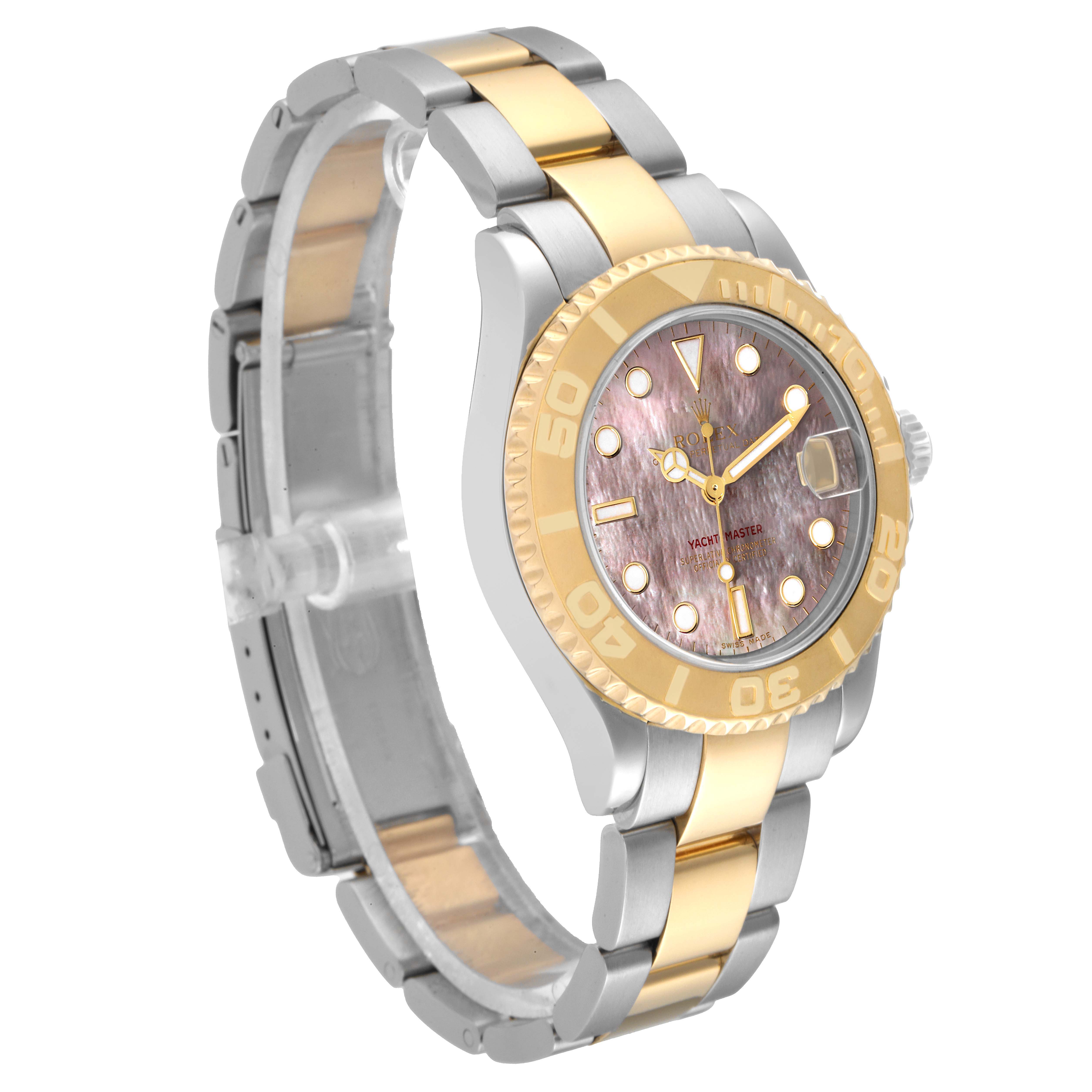 The Rolex Yacht-Master 168623 Men's Steel and Gold (two tone) Mother of Pearl Dial 168623 Men's Steel and Gold (two tone) Mother of Pearl Dial watch is shown at a slight side angle, displaying the dial, bezel, and bracelet.