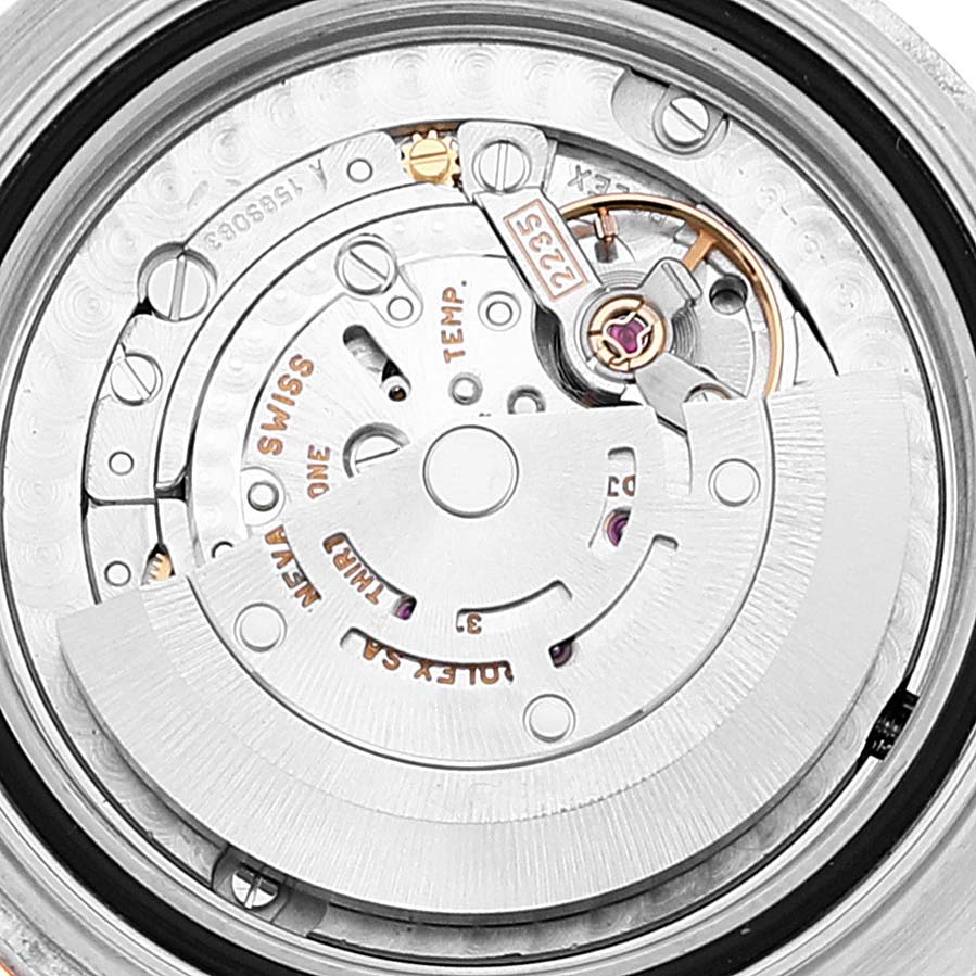 The image shows a close-up view of the movement mechanism of a Rolex Yacht-Master 168623 Men's Steel and Gold (two tone) Mother of Pearl Dial 168623 Men's Steel and Gold (two tone) Mother of Pearl Dial watch.